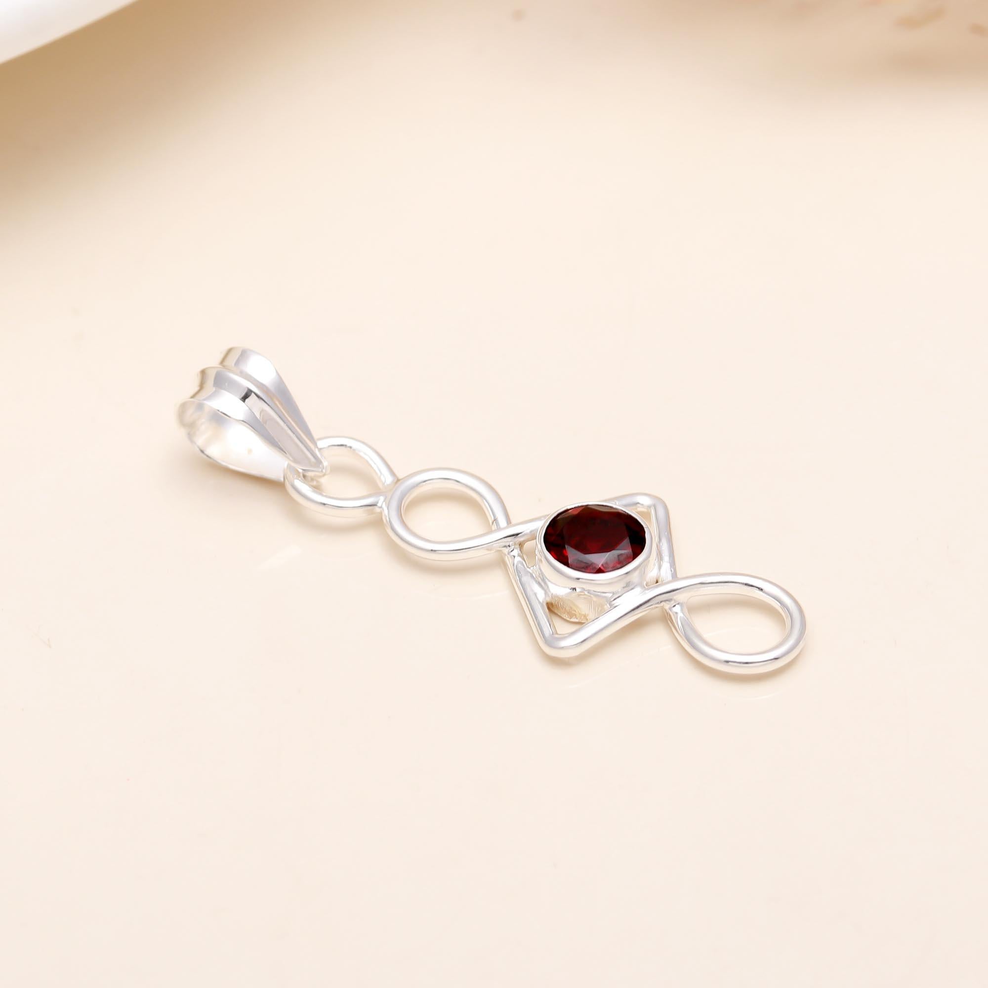 The Linear Loop: Geometric Red Garnet Infinity Drop Pendant
