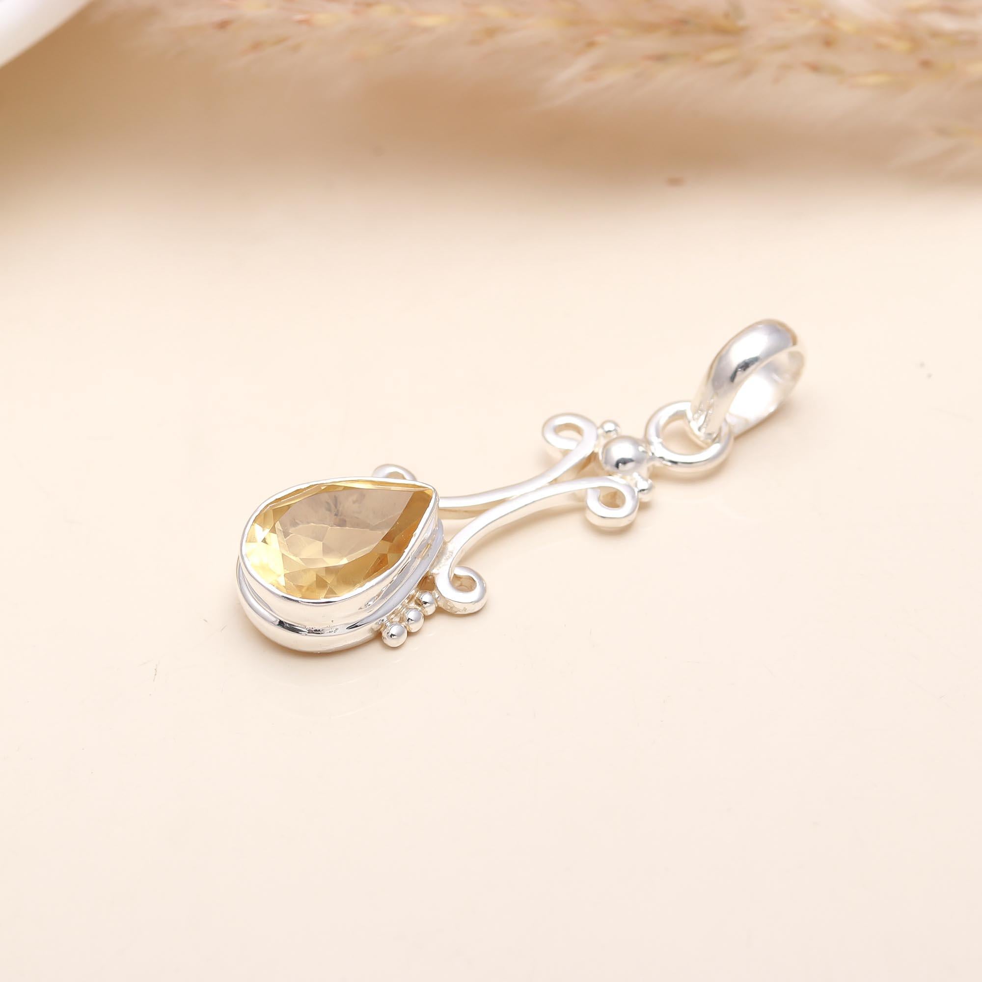 The Golden Drop: Citrine & Silver Scroll Pendant