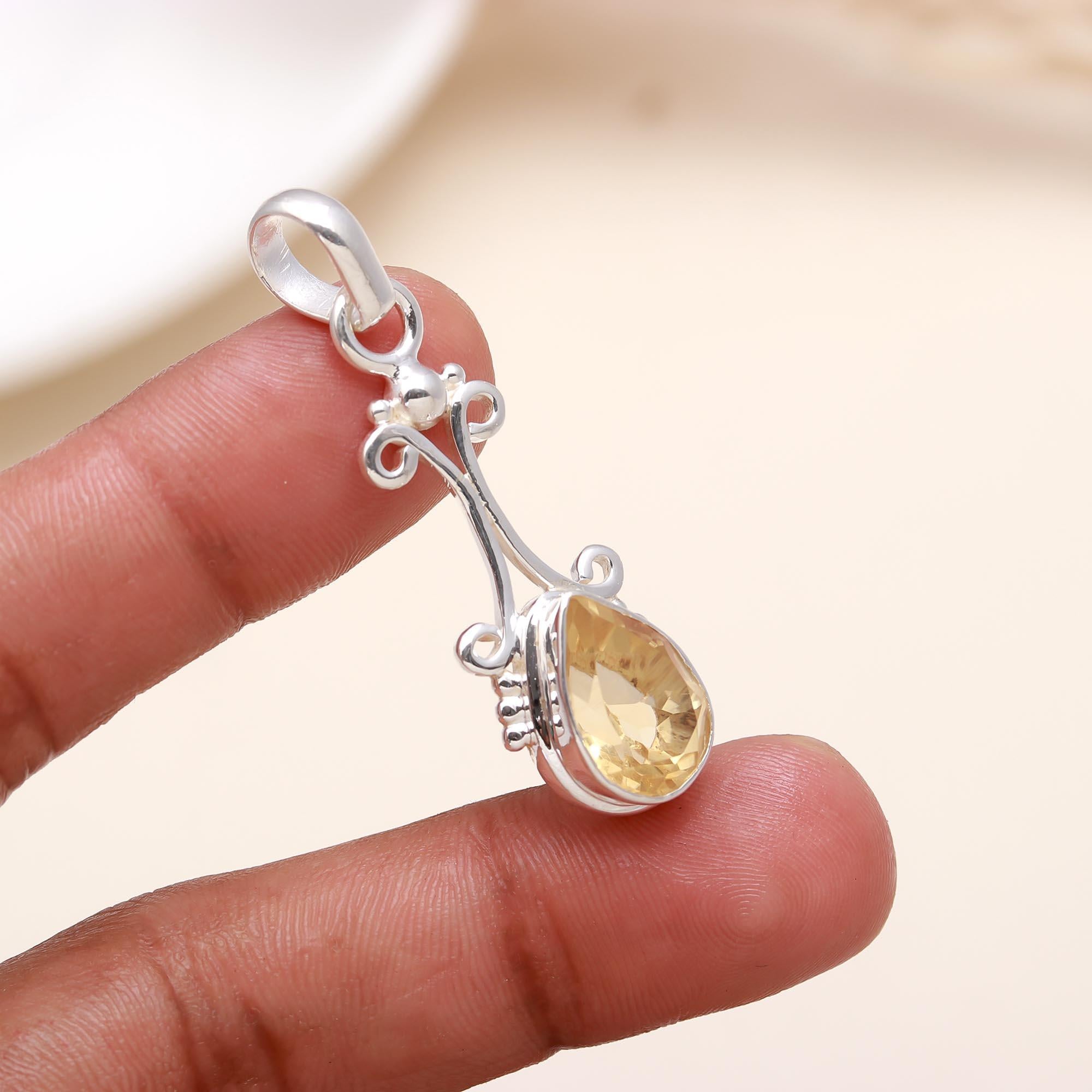 The Golden Drop: Citrine & Silver Scroll Pendant