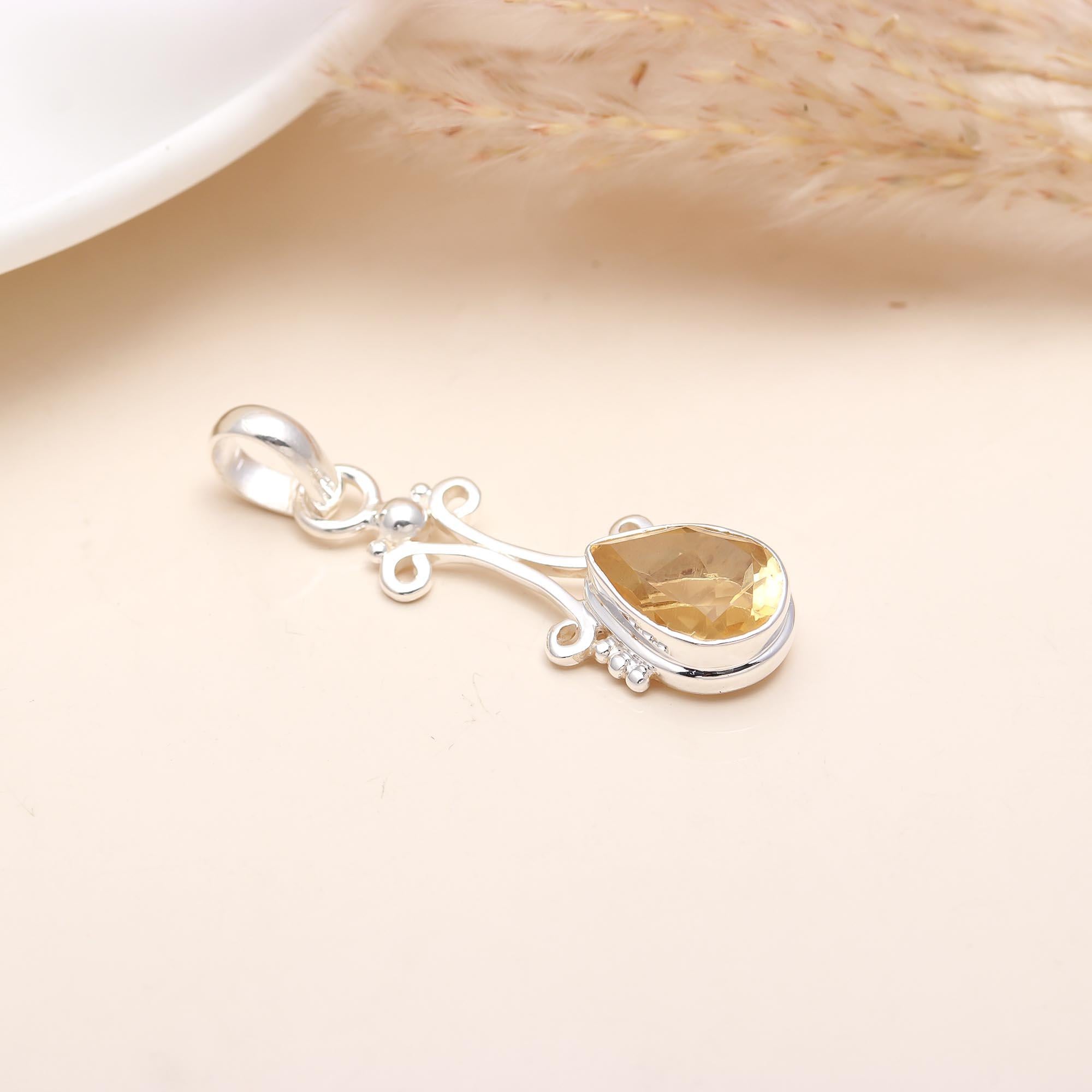 The Golden Drop: Citrine & Silver Scroll Pendant