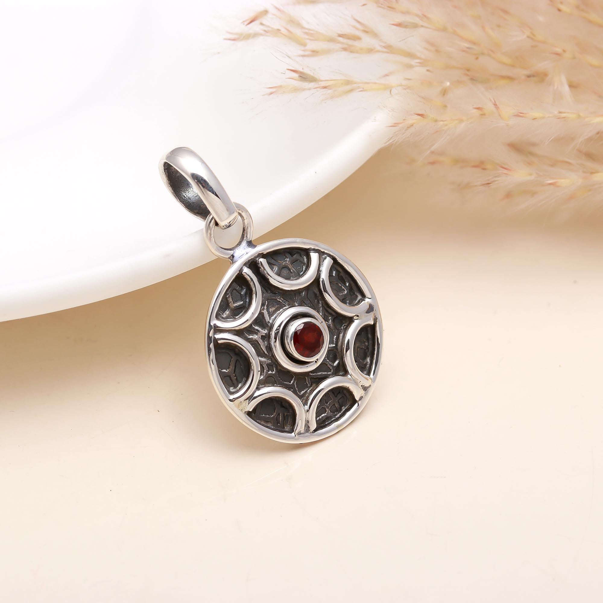 The Celtic Wheel: Oxidized Sterling Silver & Garnet Medallion