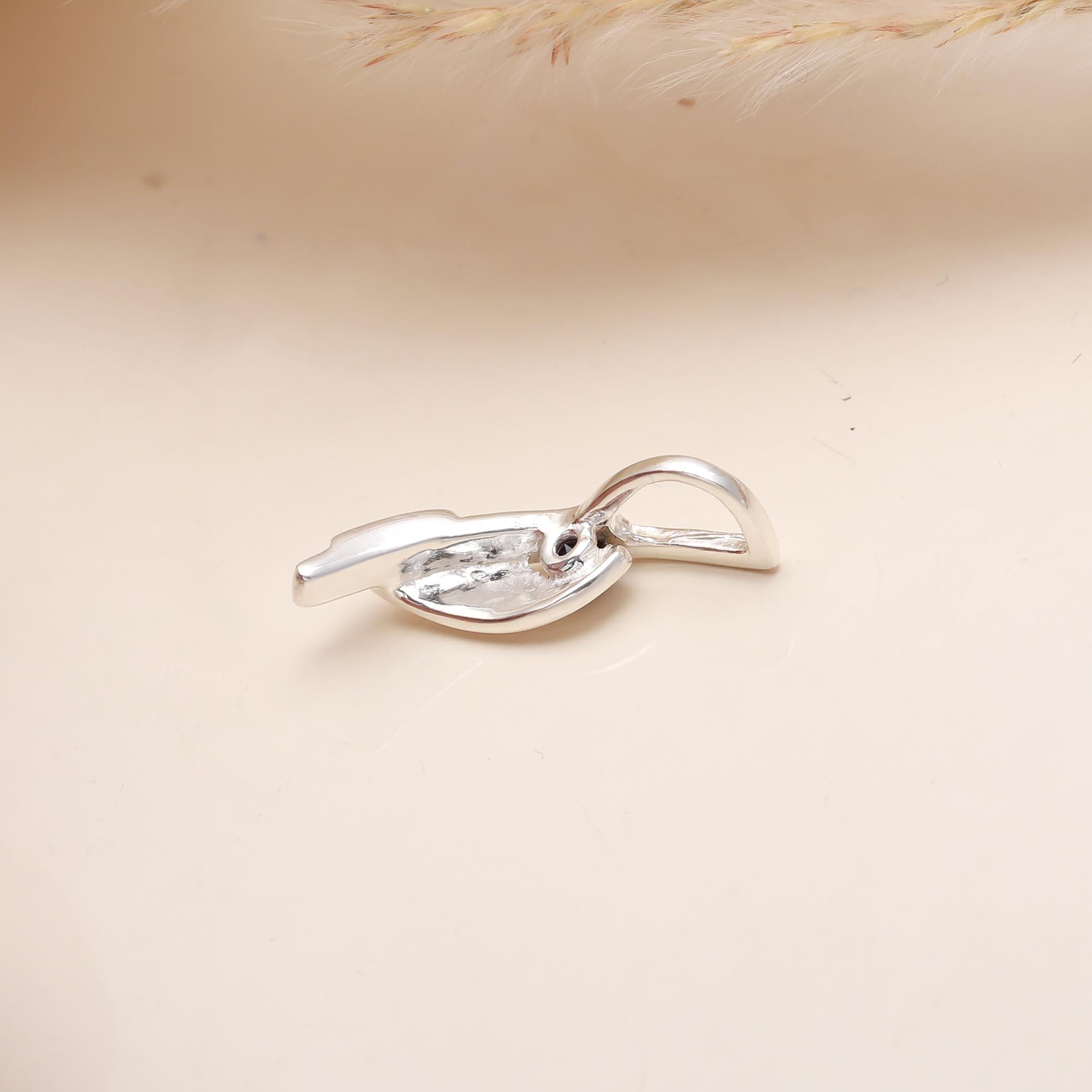 The Sculptural Fold: Abstract Sterling Silver & Sapphire Pendant