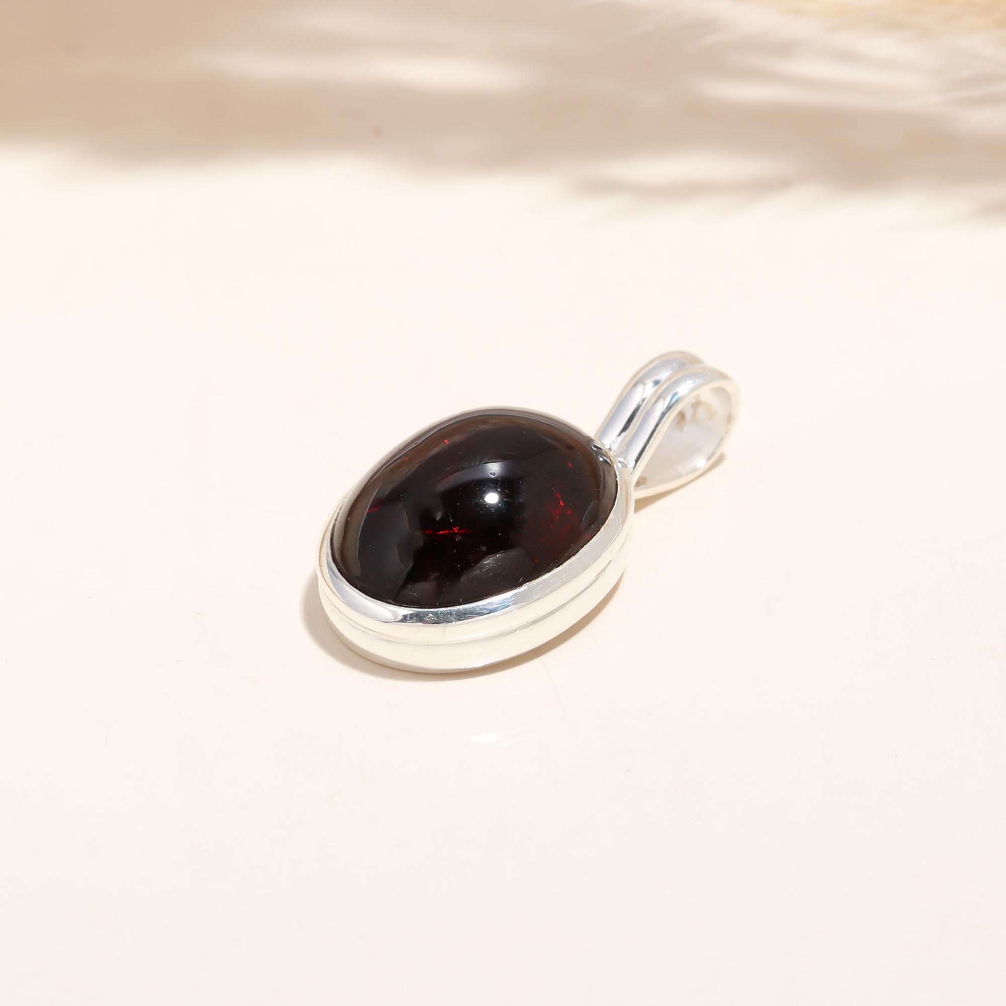 The Crimson Solitaire: Oval Garnet Minimalist Pendant