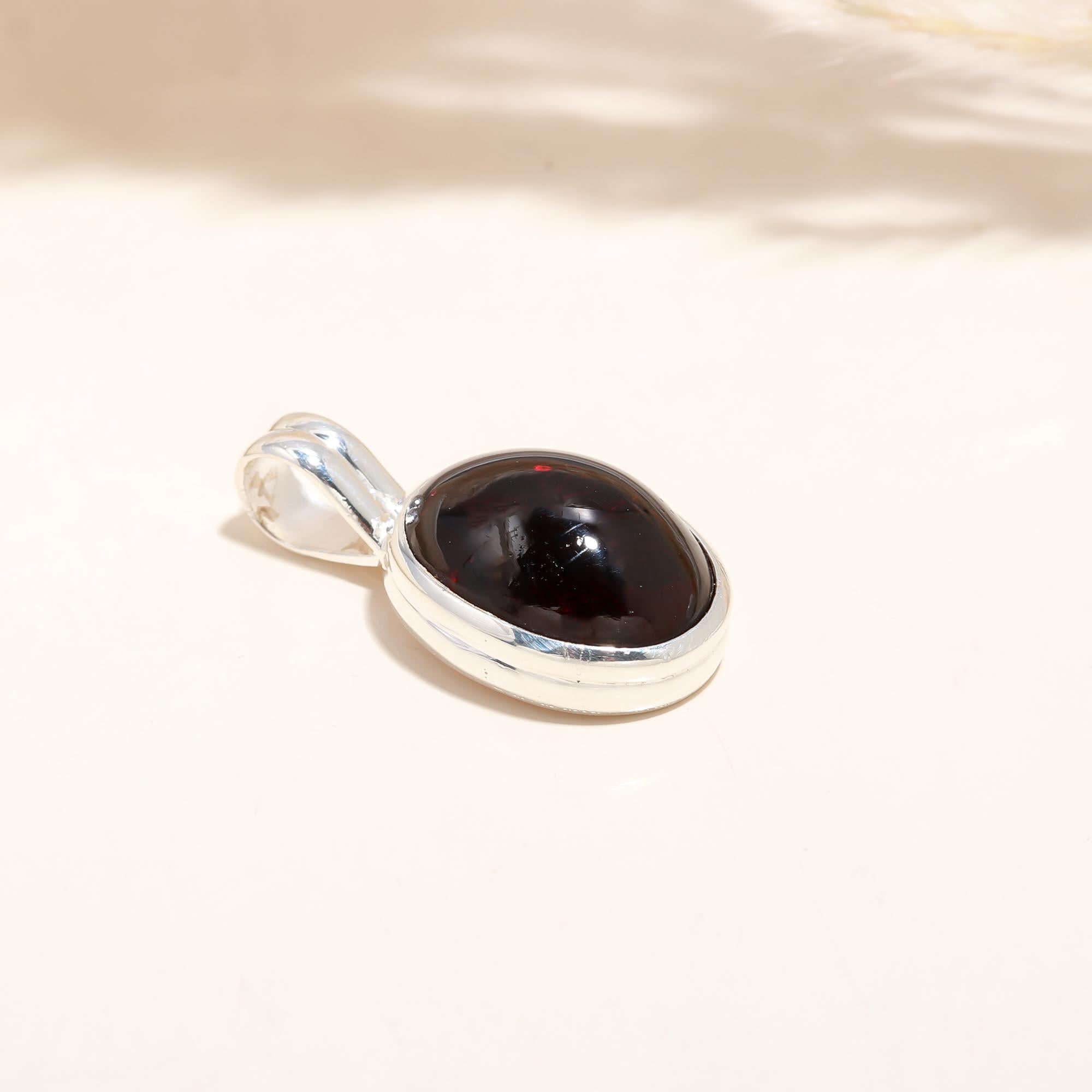 The Crimson Solitaire: Oval Garnet Minimalist Pendant