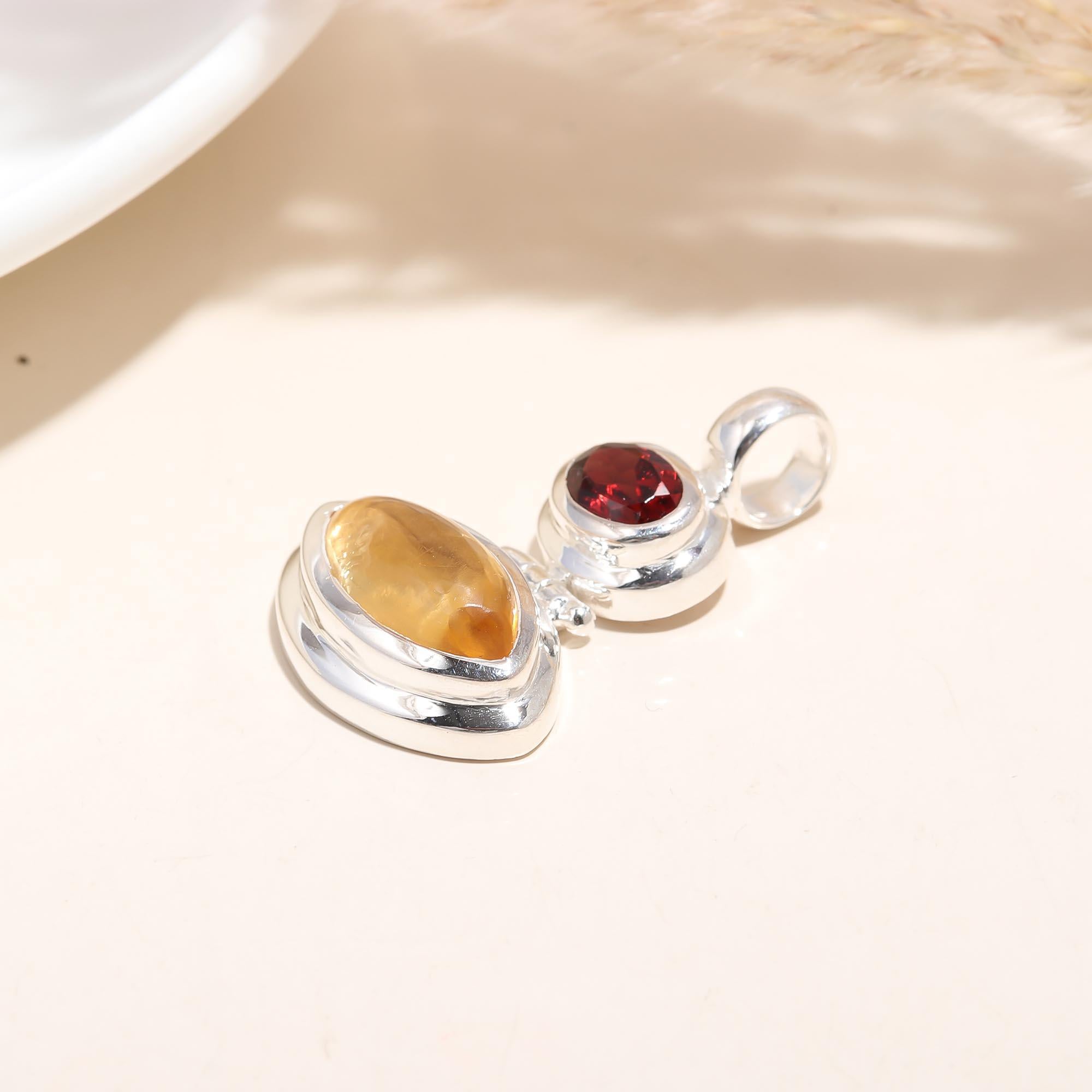 The Solar Flare Drop: Citrine & Garnet Articulated Pendant