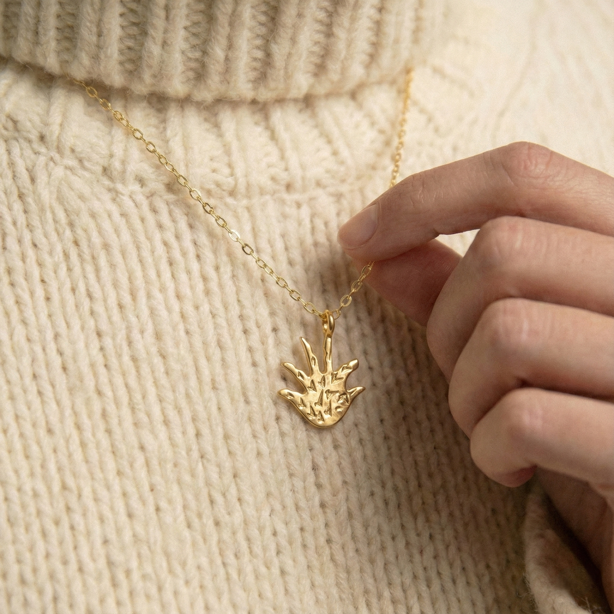The Golden Palm: Abstract Textured Hand Necklace
