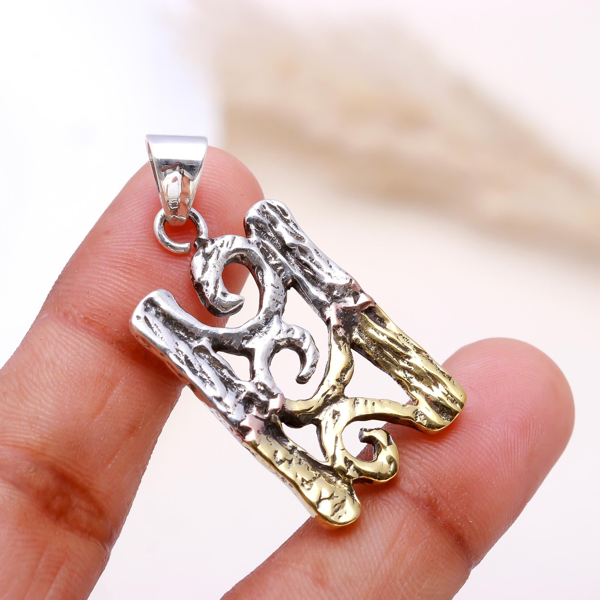 The Rustic Scroll: Dual-Tone Abstract Bark Texture Pendant