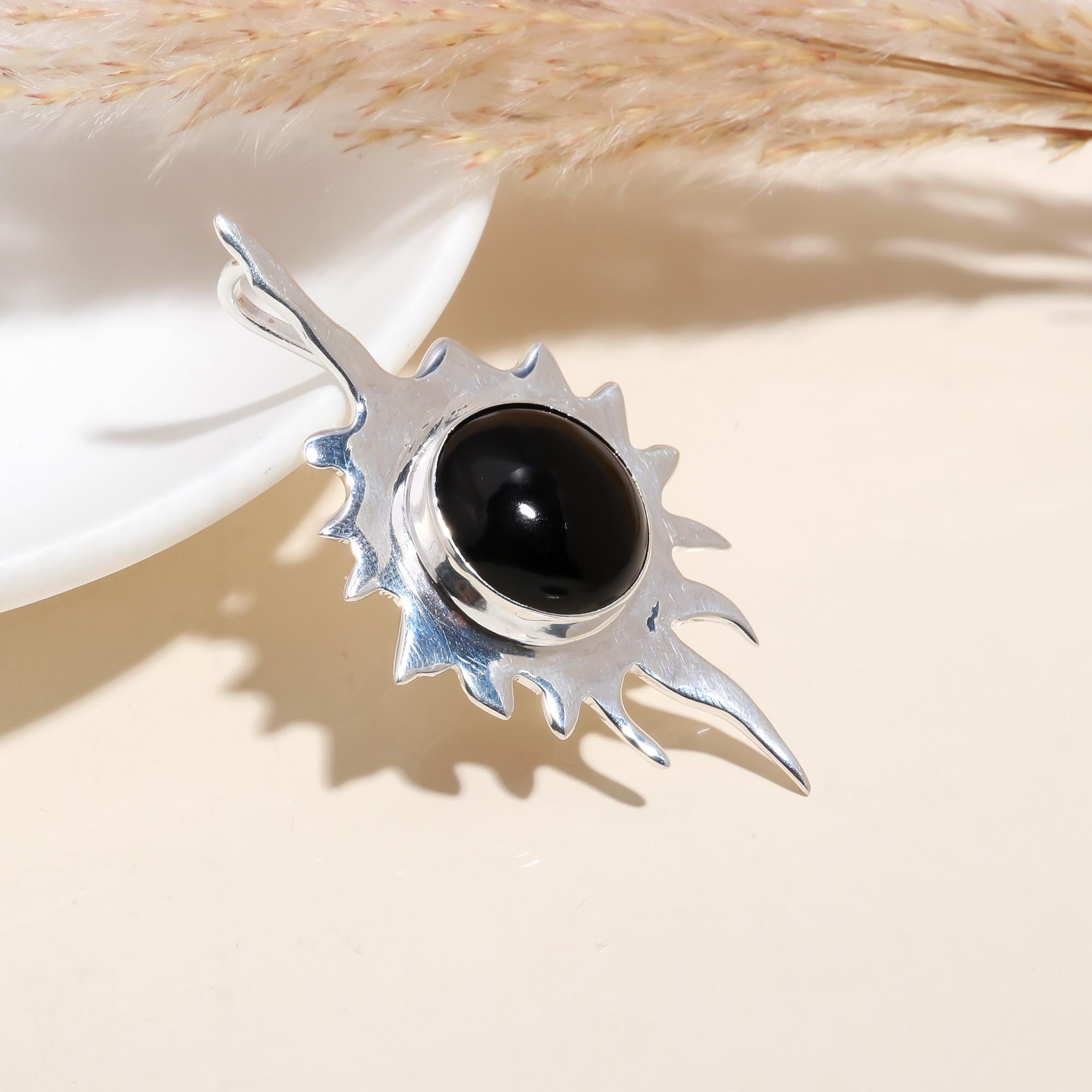 The Onyx Starburst: Celestial Flame Pendant