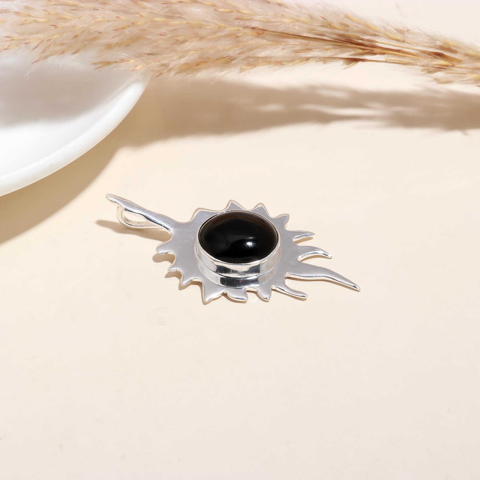 The Onyx Starburst: Celestial Flame Pendant