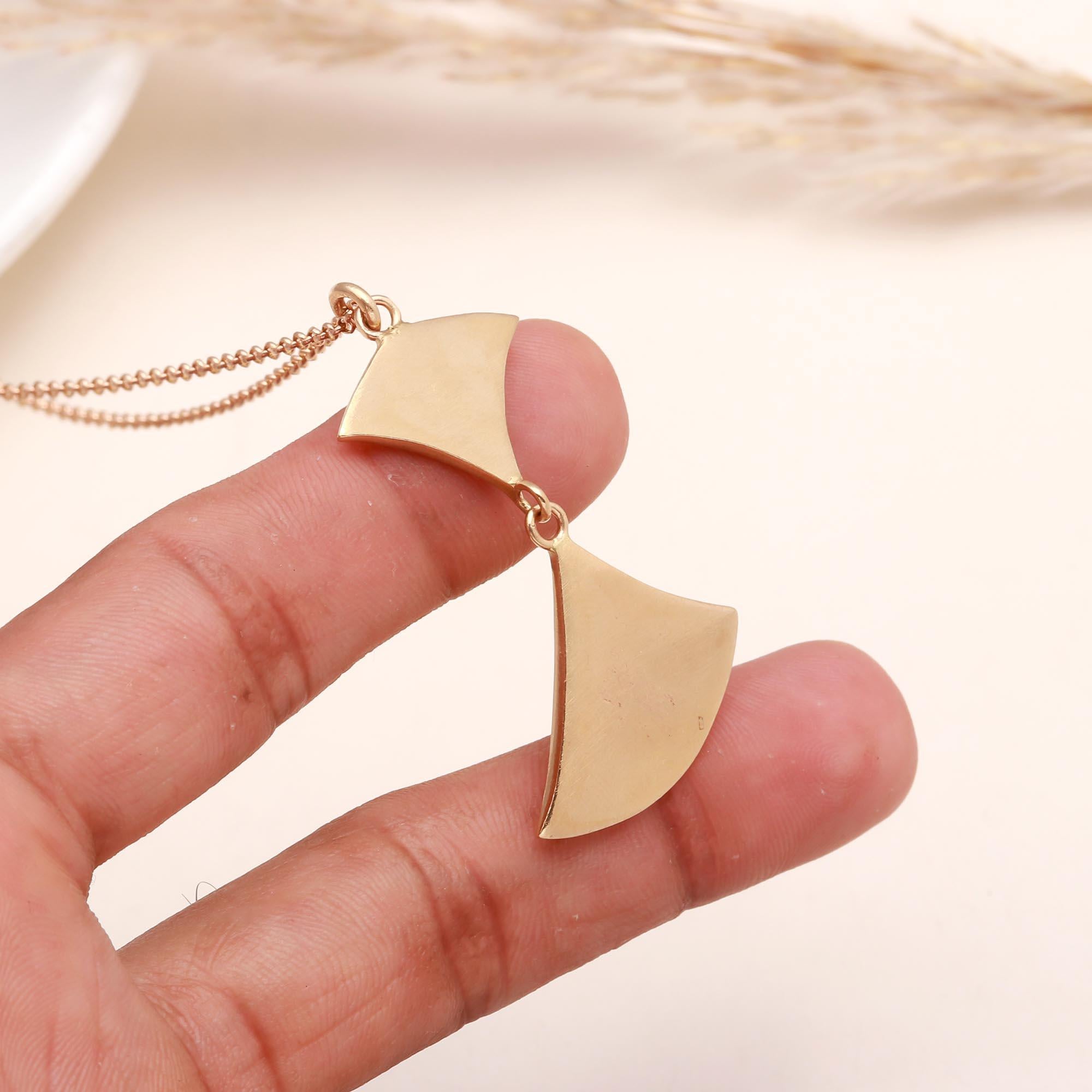 The Modern Wing: Geometric Gold Abstract Necklace