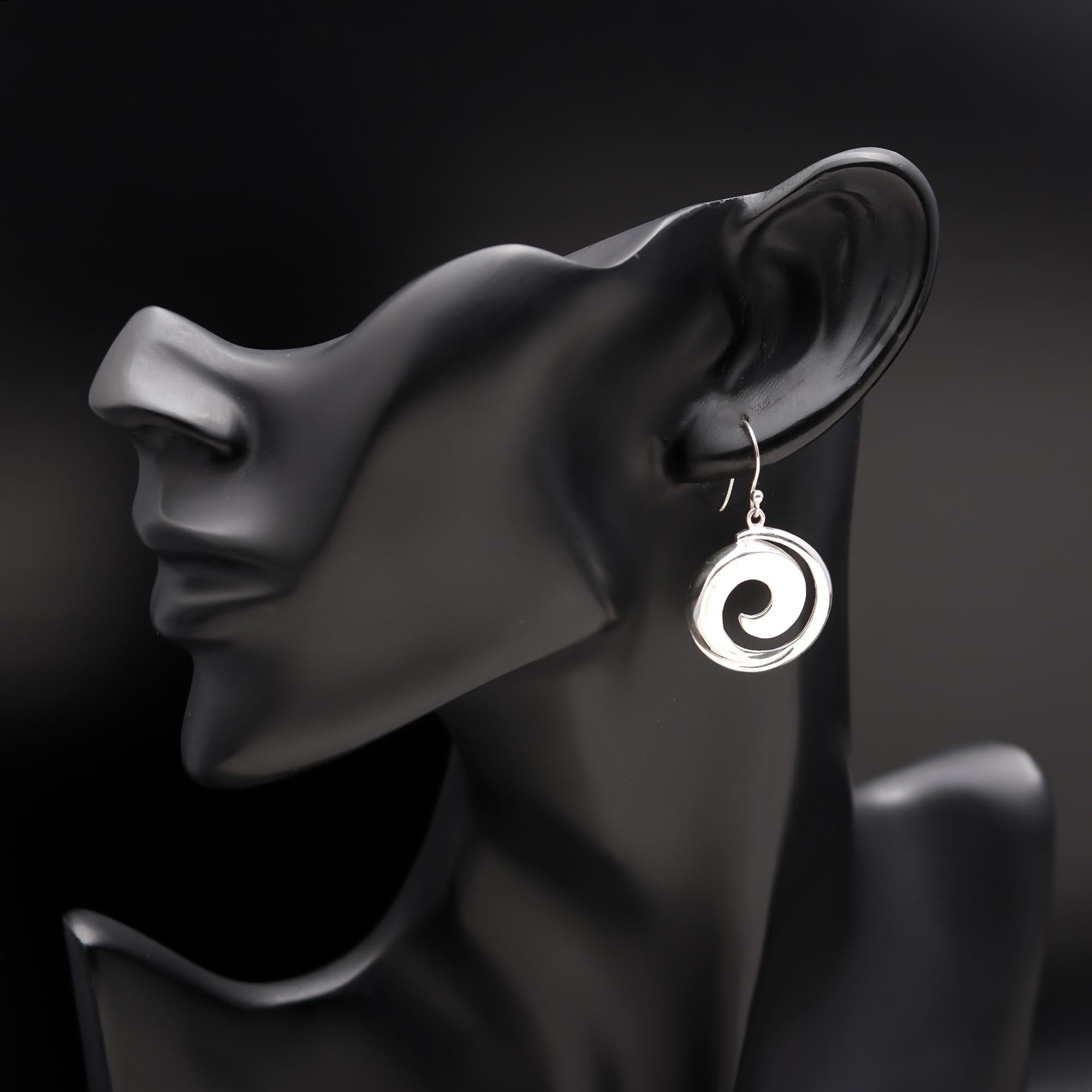 The Sterling Vortex: Polished Silver Spiral Drop Earrings