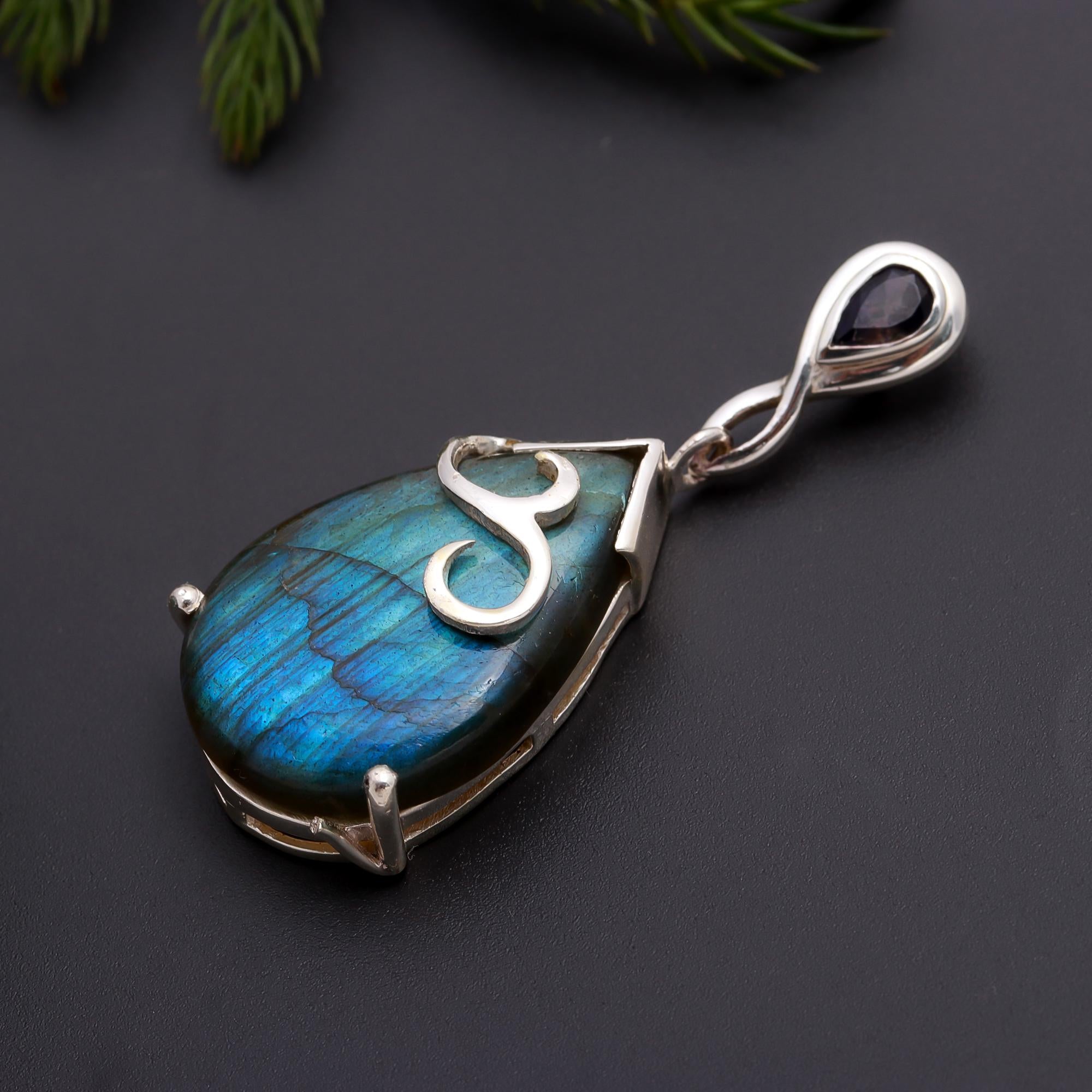 The Mystic Amulet: Labradorite & Silver Teardrop Pendant