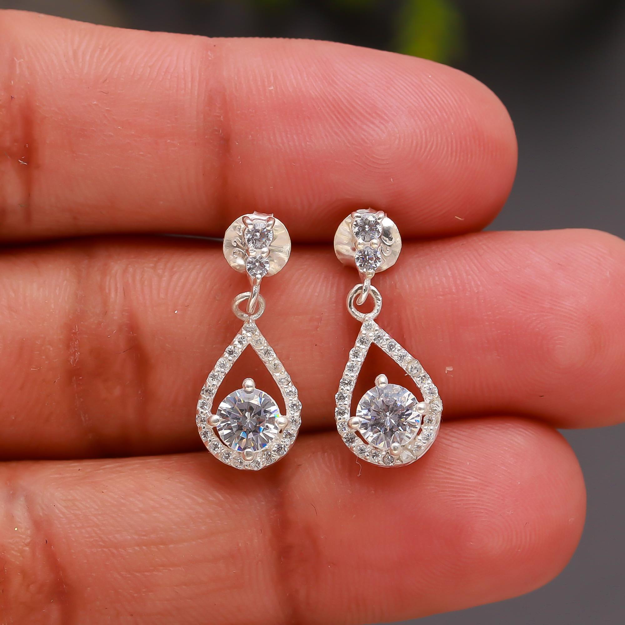 The Crystal Cascade: Cubic Zirconia & Silver Halo stud Earrings