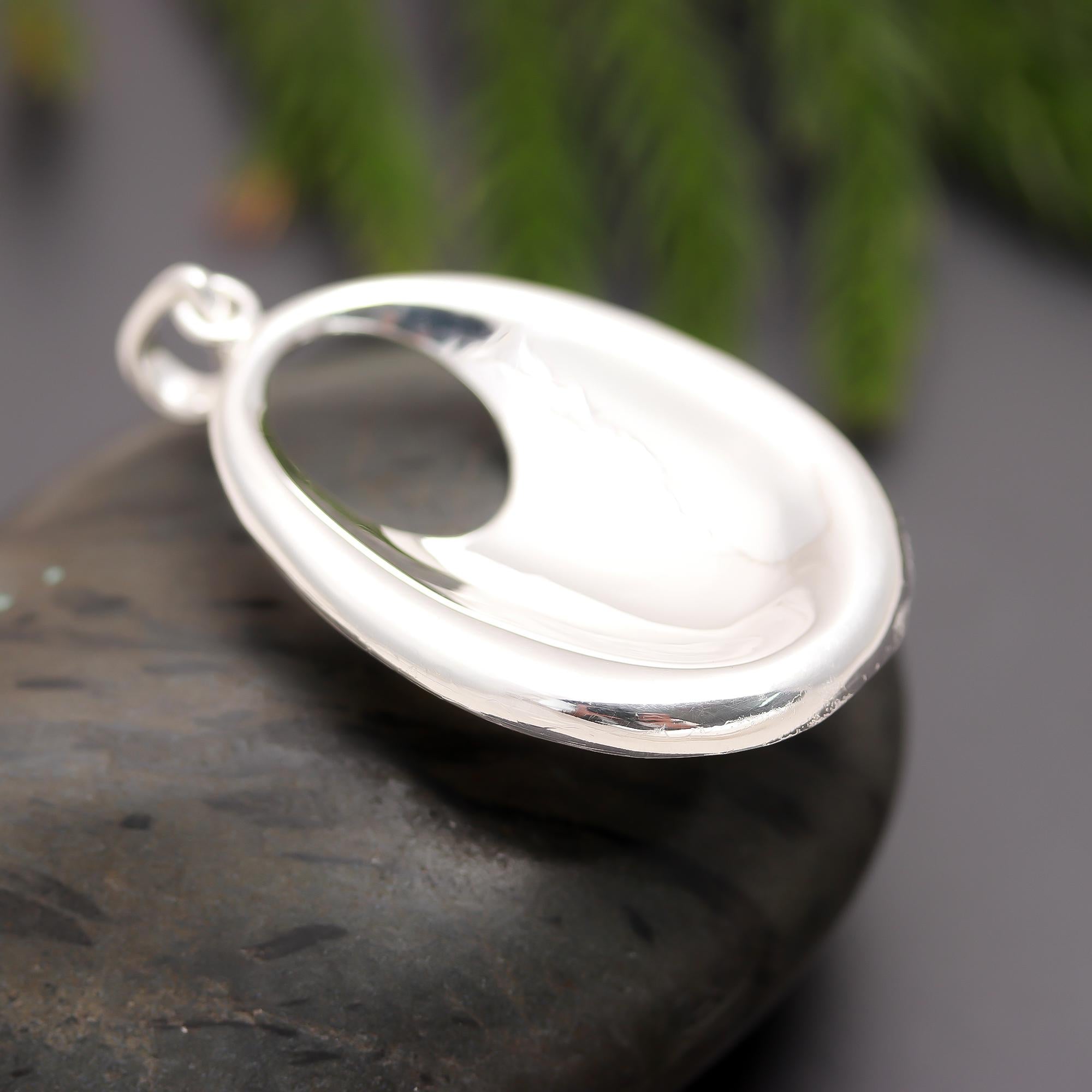 The Liquid Oval: Sculptural Sterling Silver Pendant
