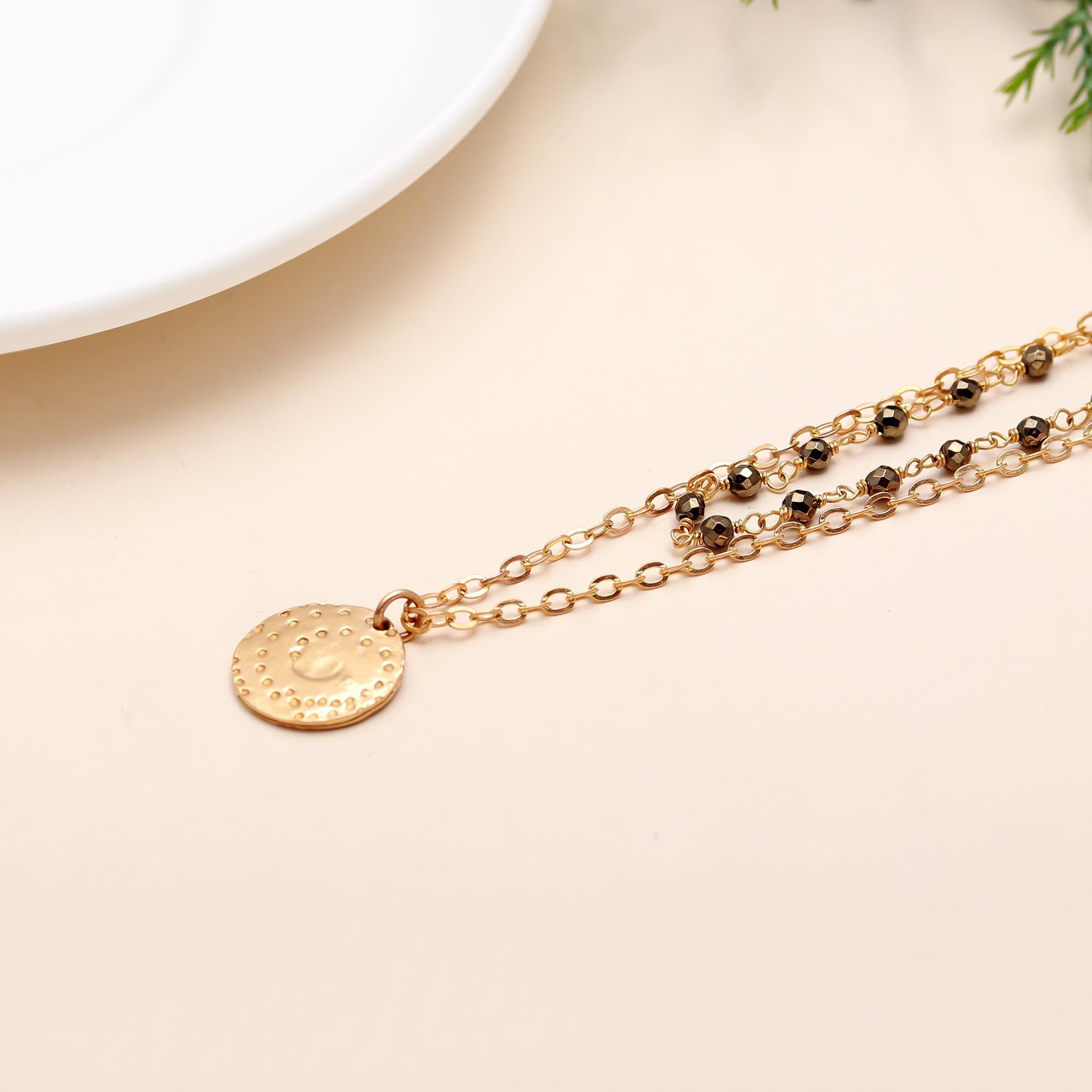 The Golden Texture: Layered Disc & Bead Necklace