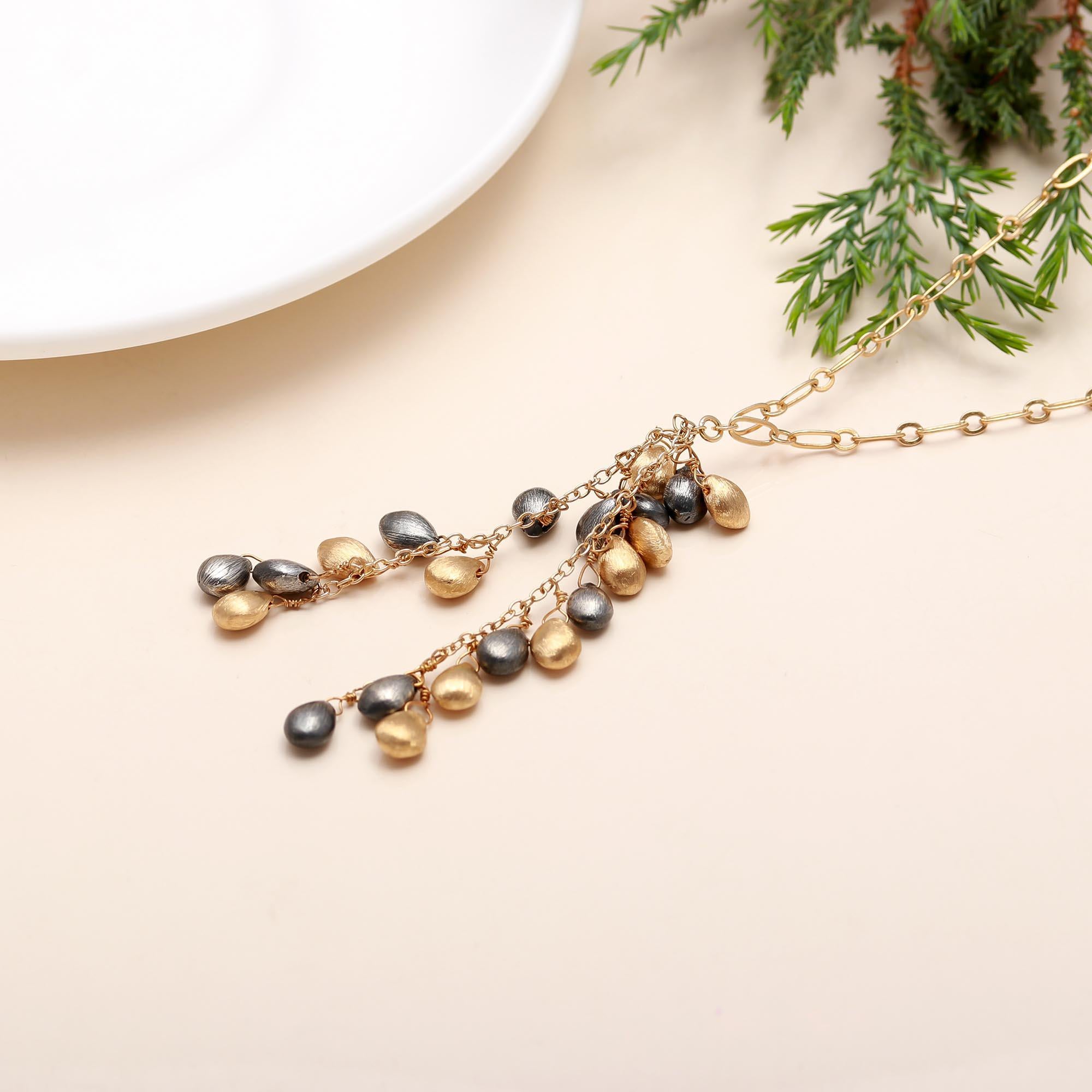 The Mixed Metal Rain: Two-Tone Teardrop Cluster Necklace