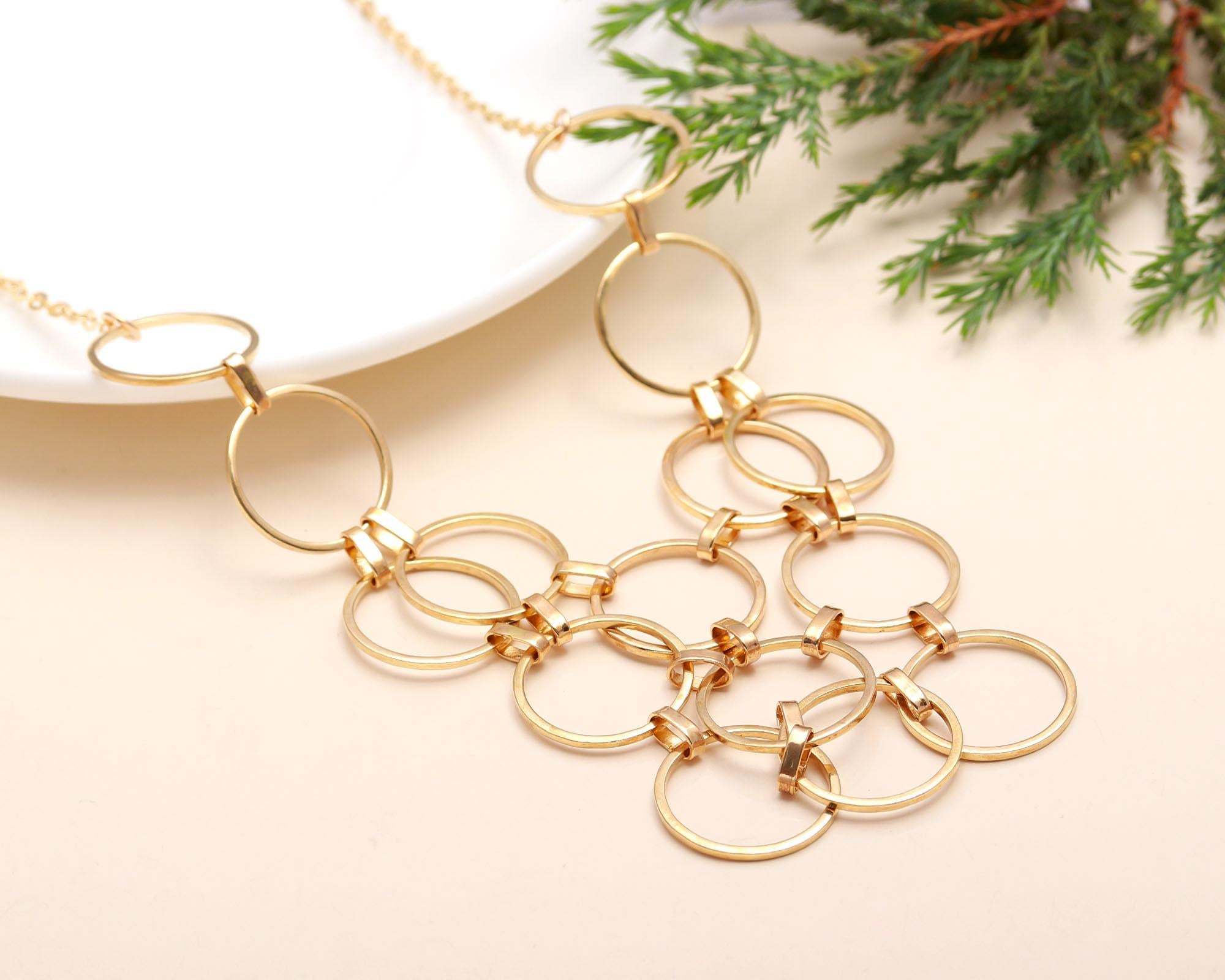 The Golden Armor: Interlocking Ring Bib Necklace