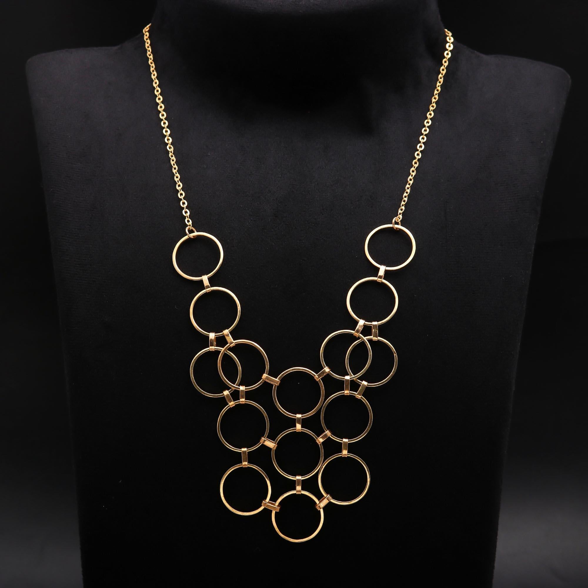 The Golden Armor: Interlocking Ring Bib Necklace