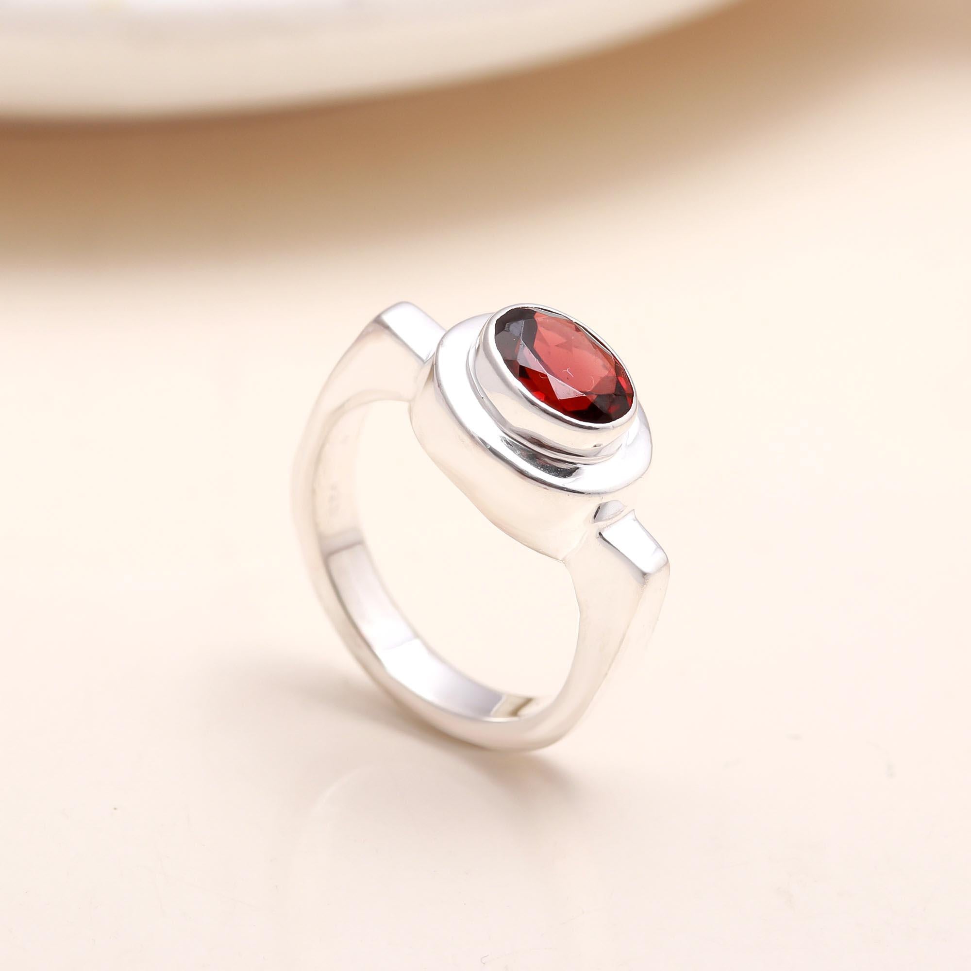 Handmade sterling silver solitaire ring with garnet