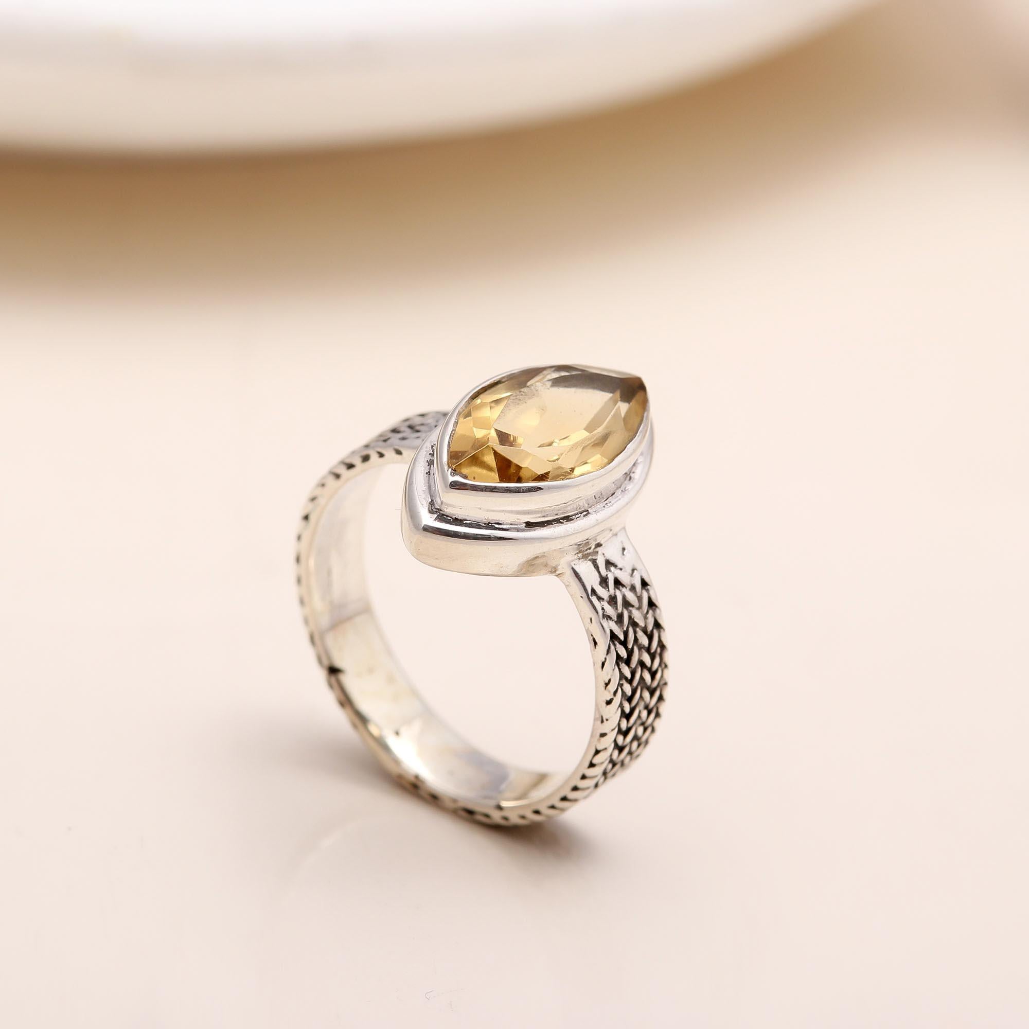 Handmade sterling silver woven band ring with citrine