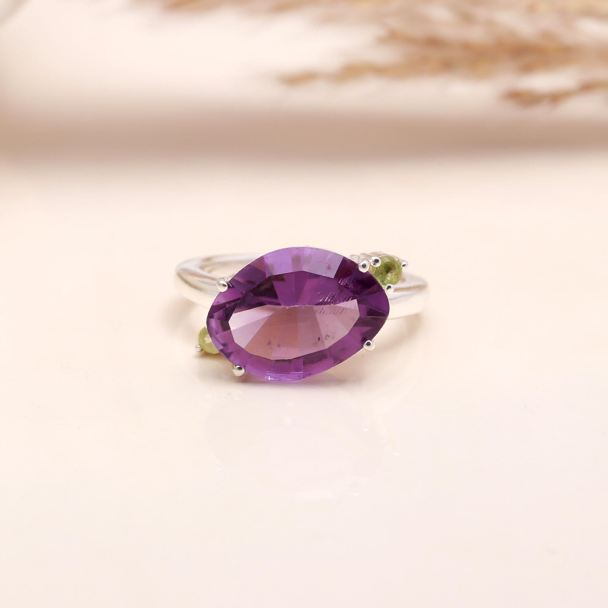 Pear-cut amethyst with peridot accents in silver band
