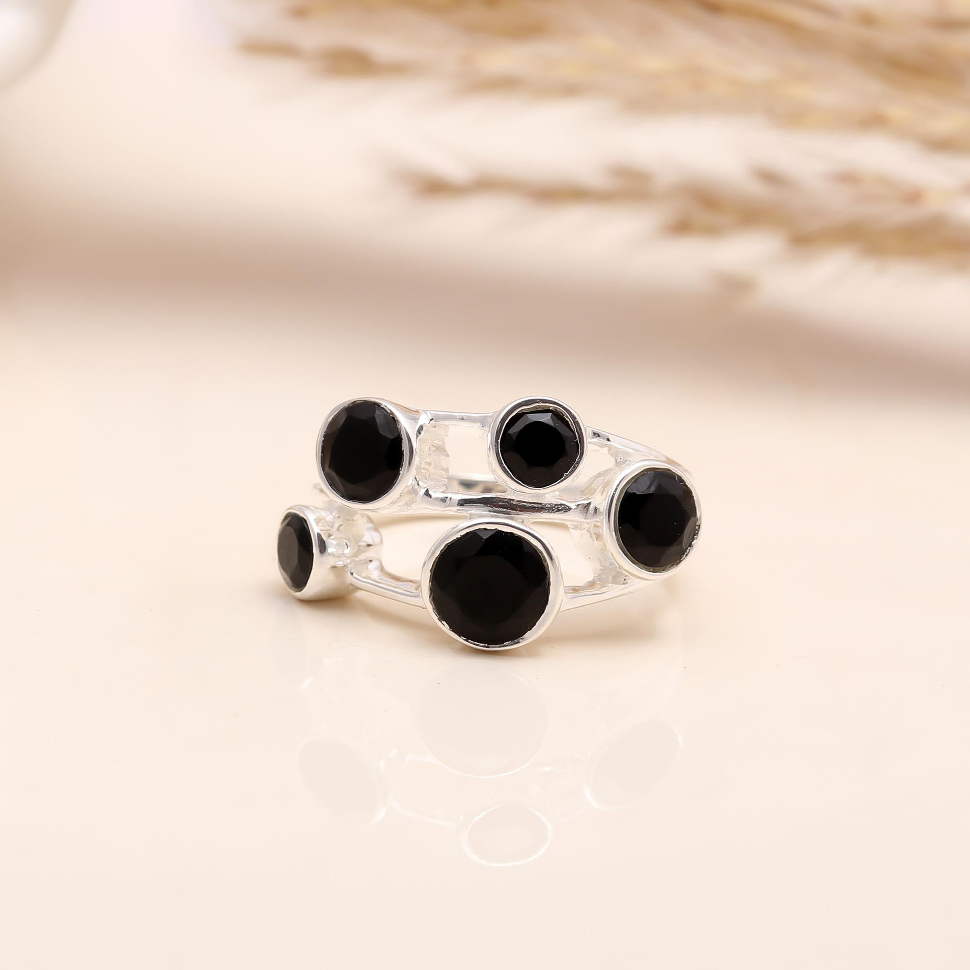 Close-up of black onyx multi-stone sterling silver cocktail ring