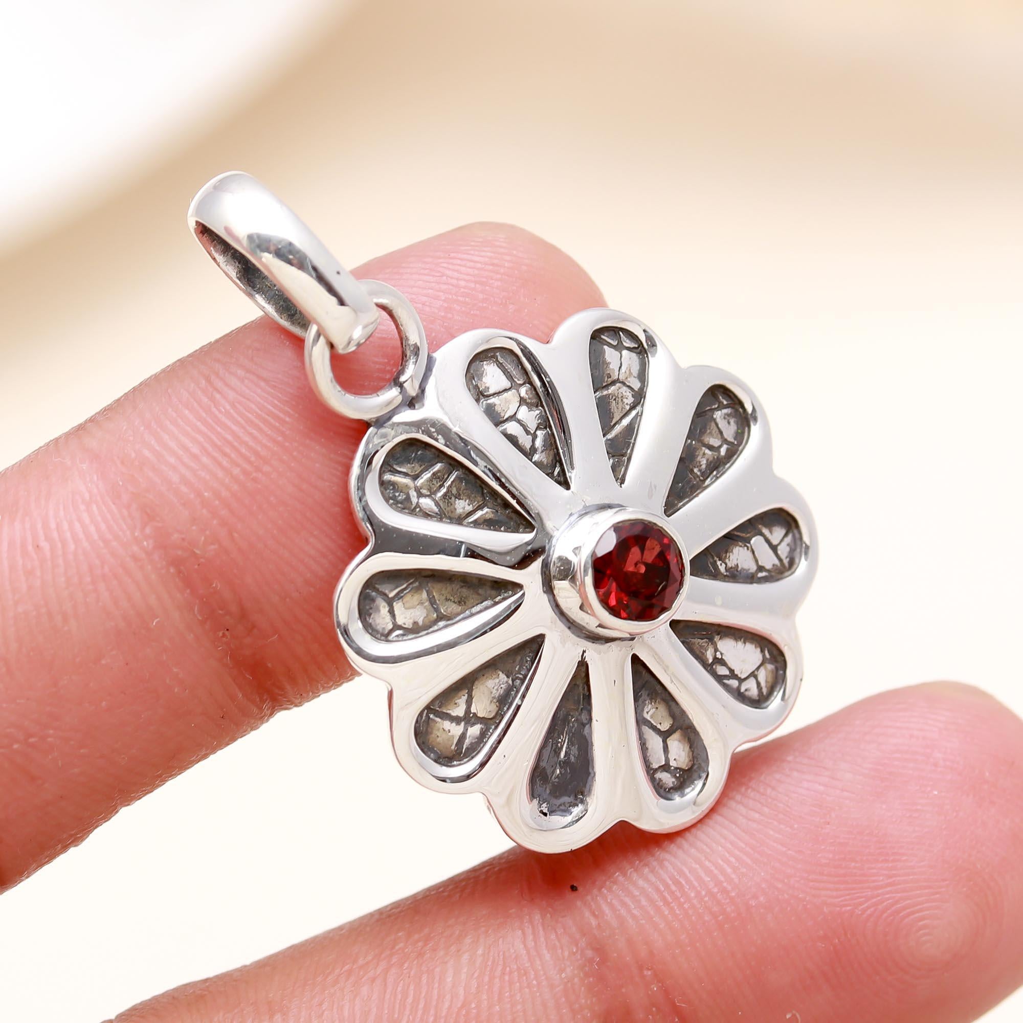 The Textured Blossom Pendant: Textured Silver Garnet Flower Pendant
