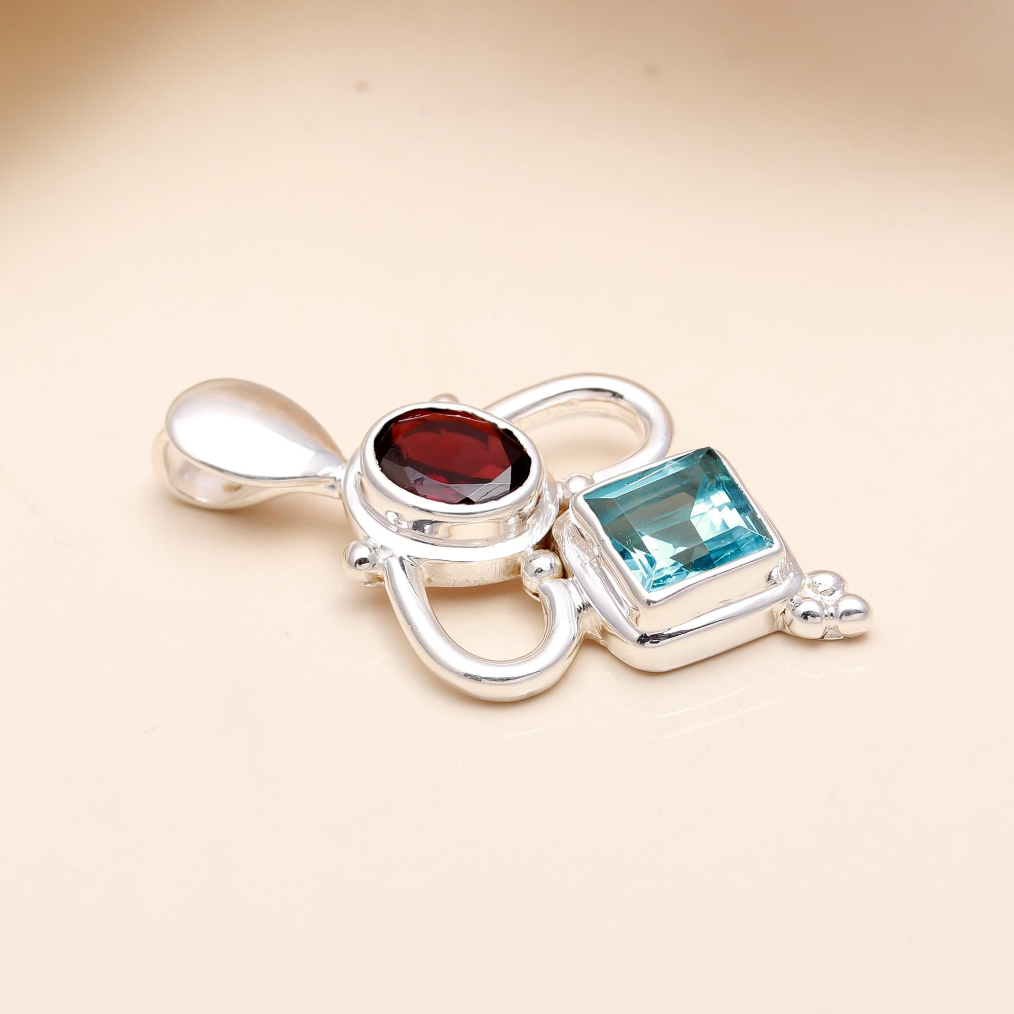 The Fire & Ice: Garnet & Blue Topaz Geometric Pendant