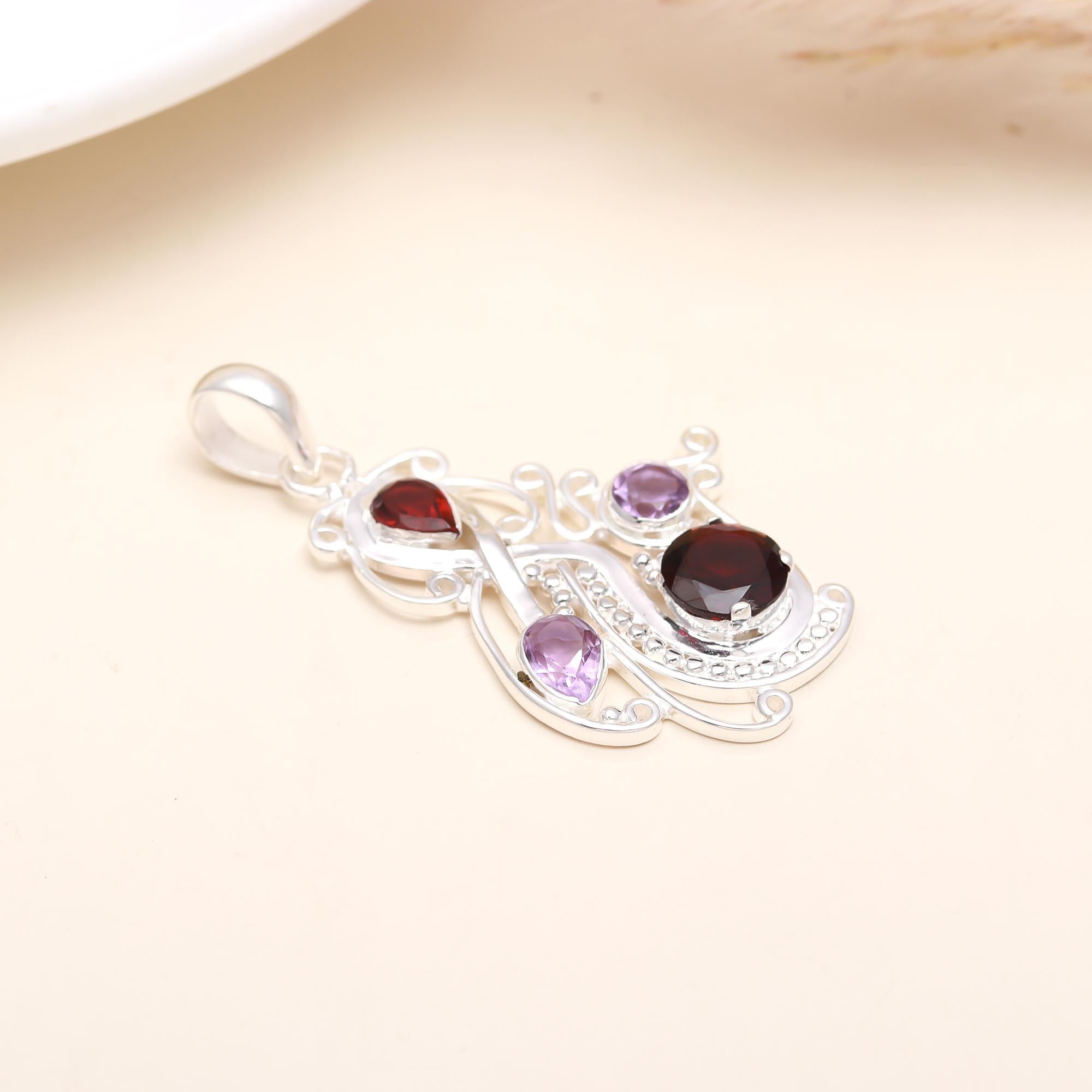 The Mystic Swirl: Garnet & Amethyst Abstract Curve Pendant