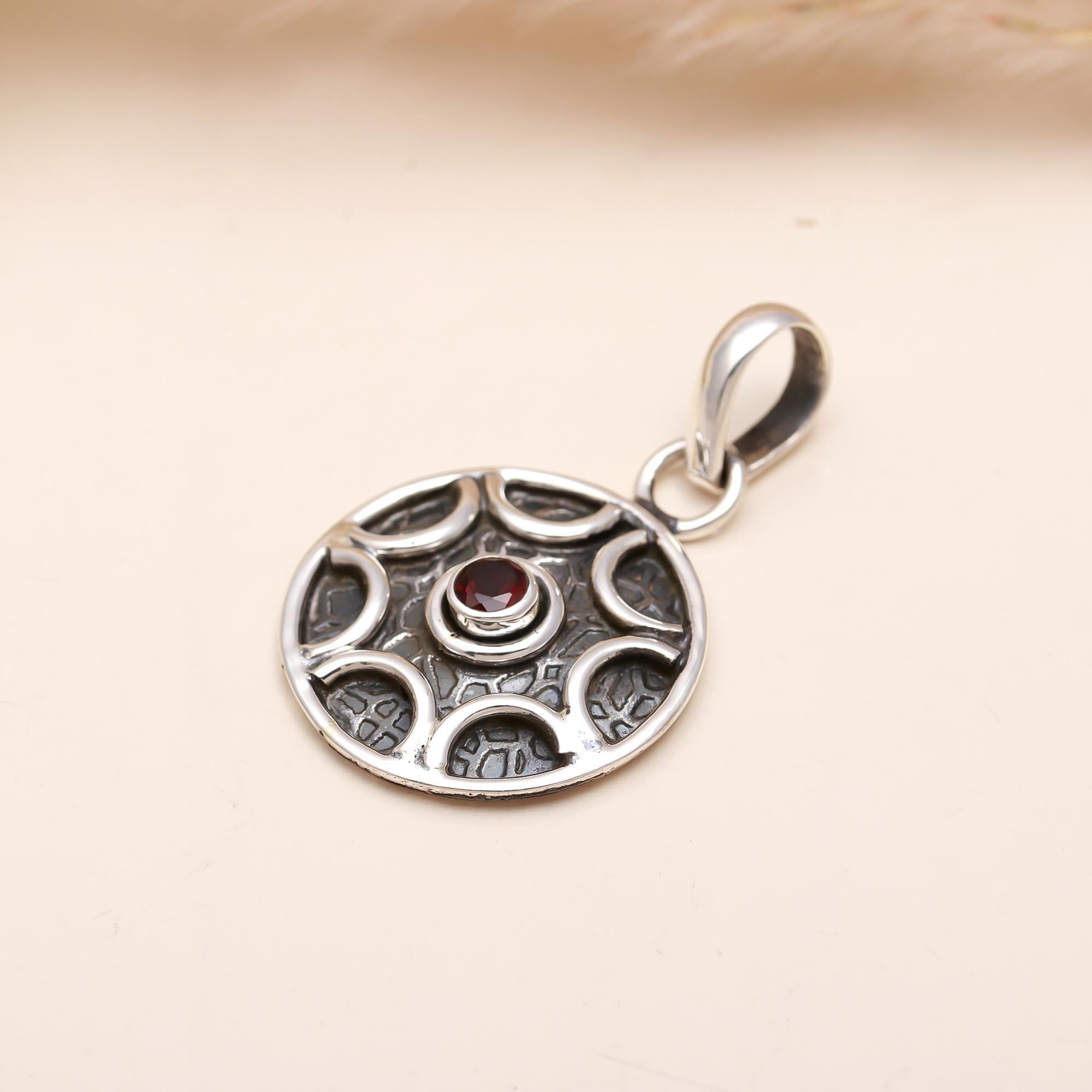 The Celtic Wheel: Oxidized Sterling Silver & Garnet Medallion