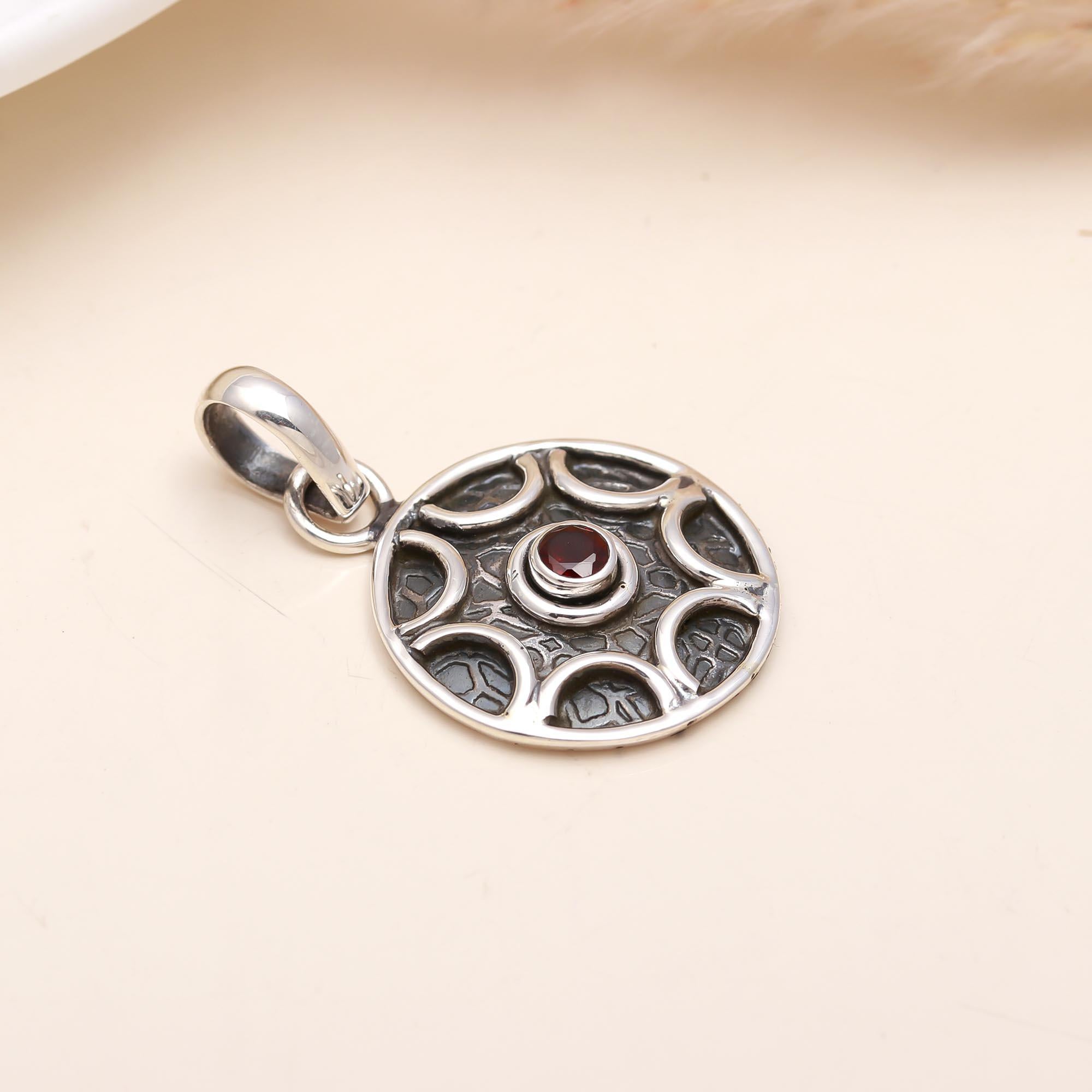 The Celtic Wheel: Oxidized Sterling Silver & Garnet Medallion