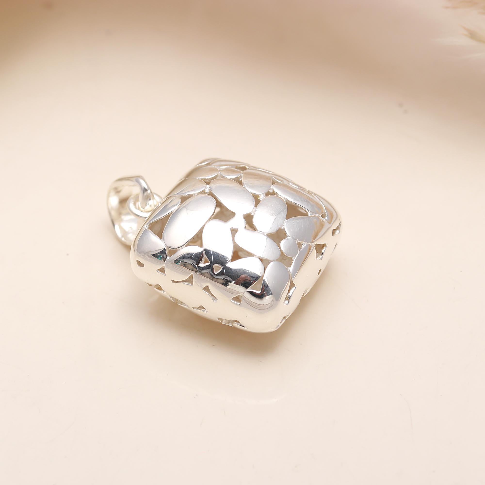 The Silver Mosaic: Abstract Cutout Pillow Pendant