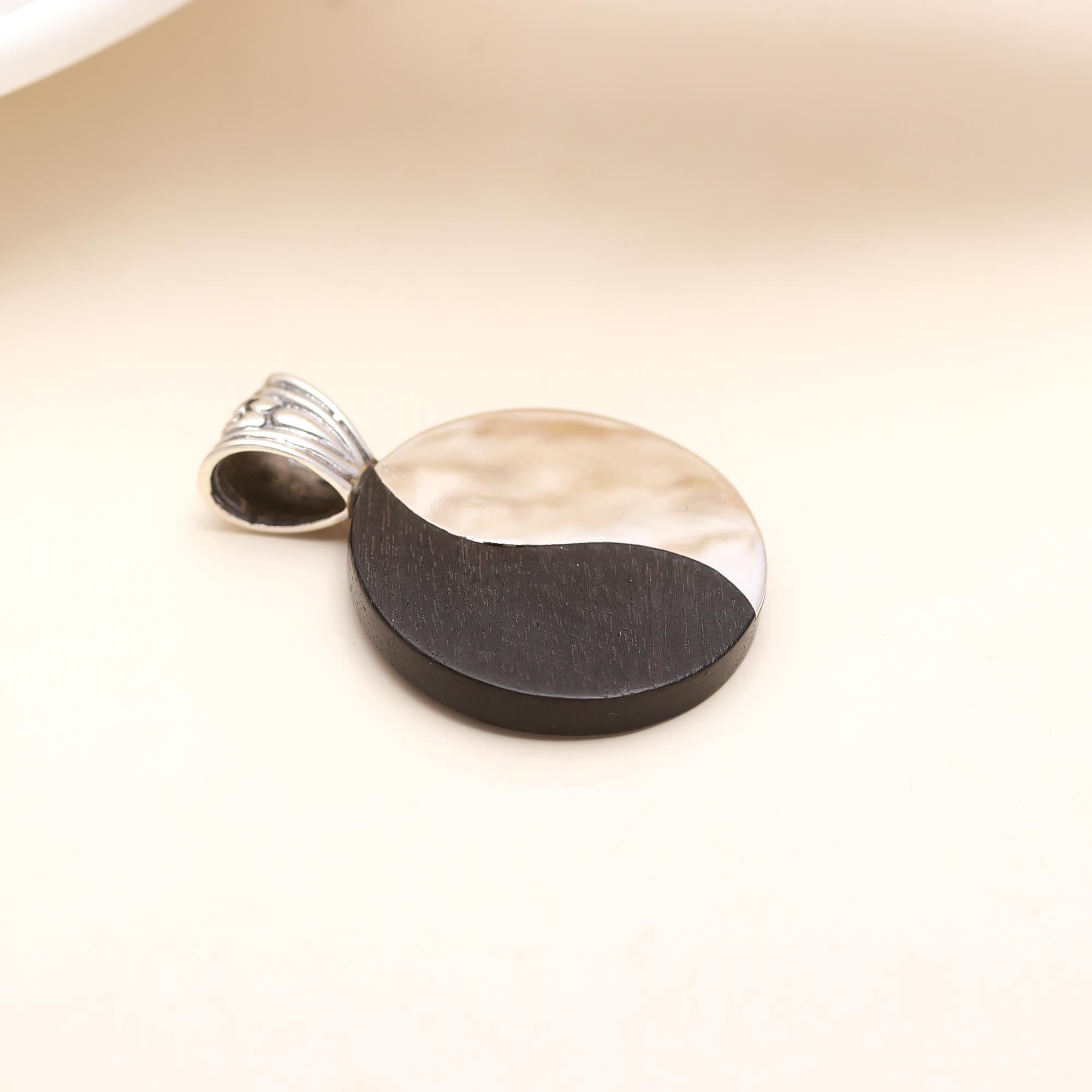 The Harmony Disc: Modern Black & Silver Round Pendant