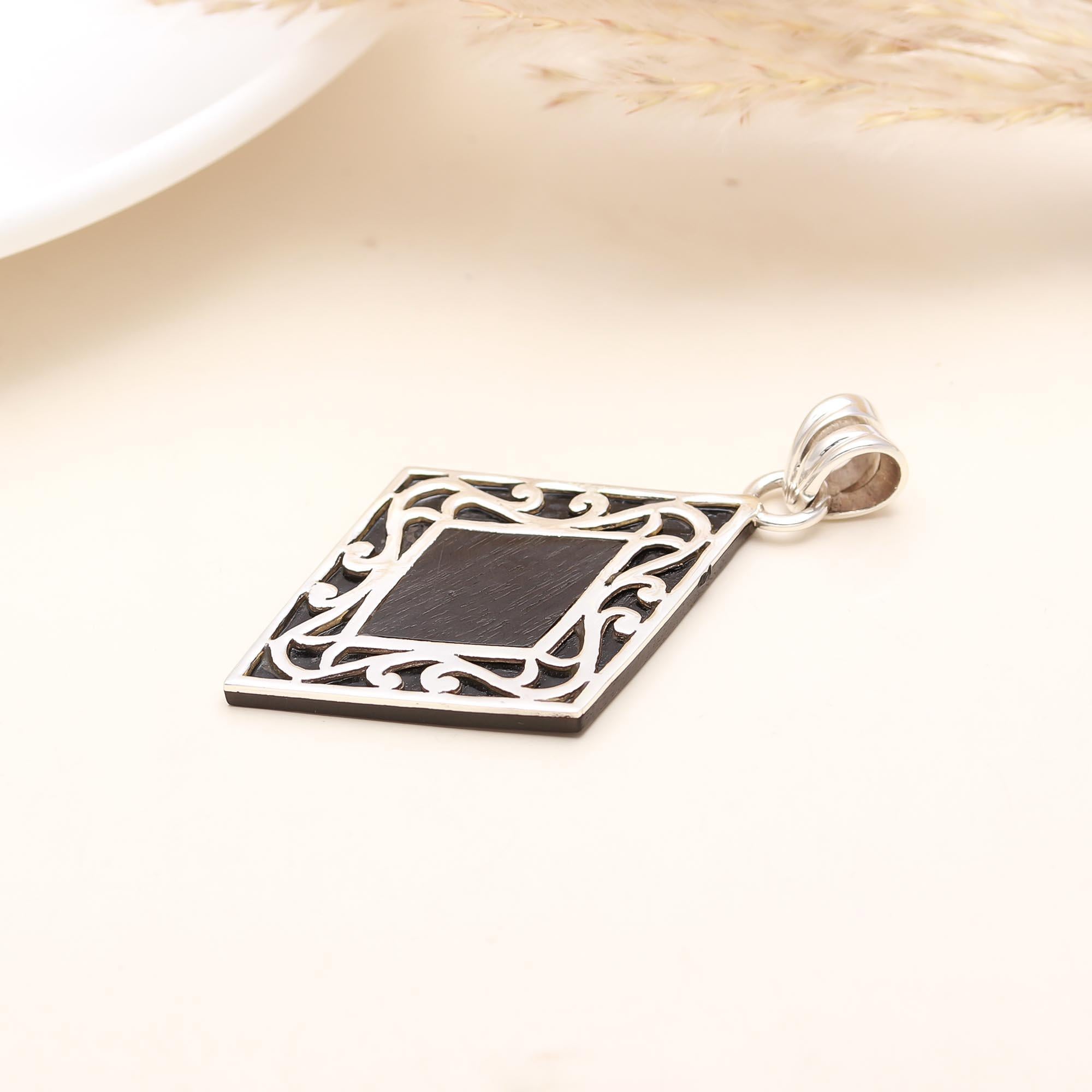 The Mystic Rhombus: Sterling Silver Scroll & Black Inlay Pendant