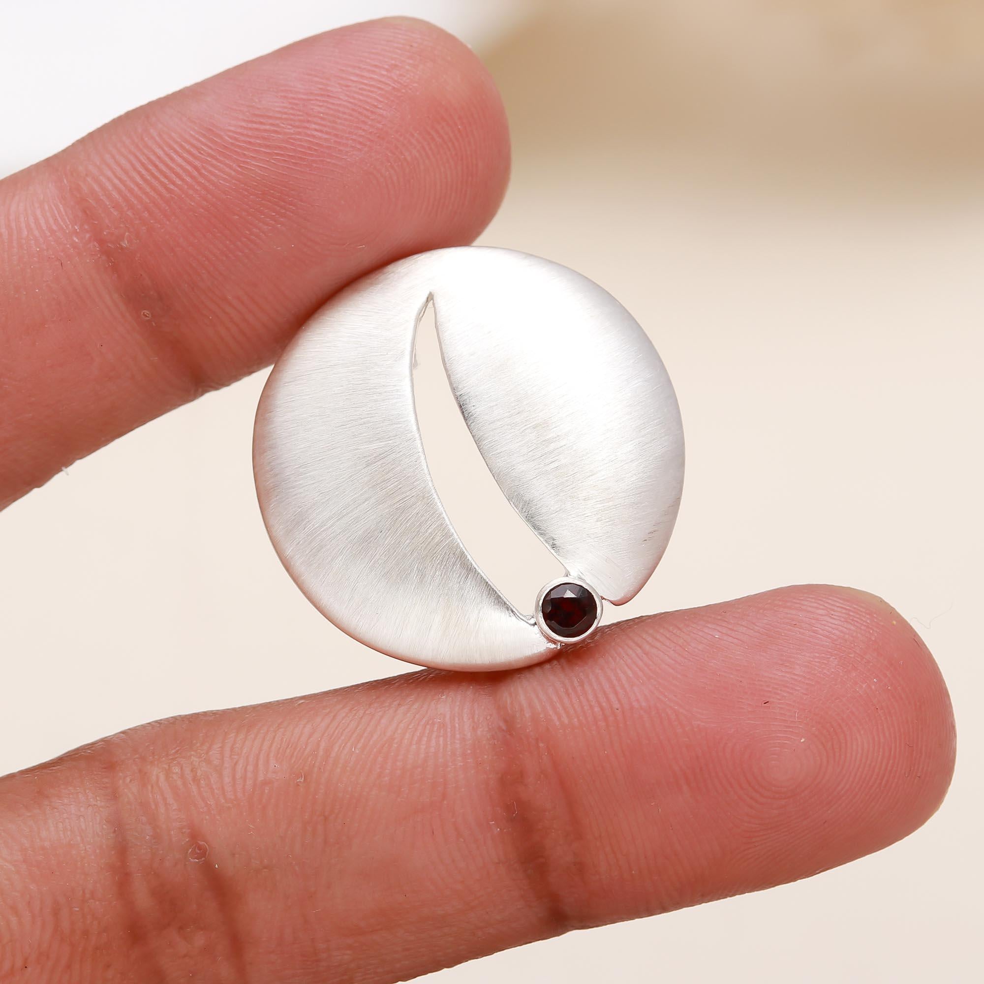 The Sculpted Path: Satin Sterling Silver & Garnet Pendant