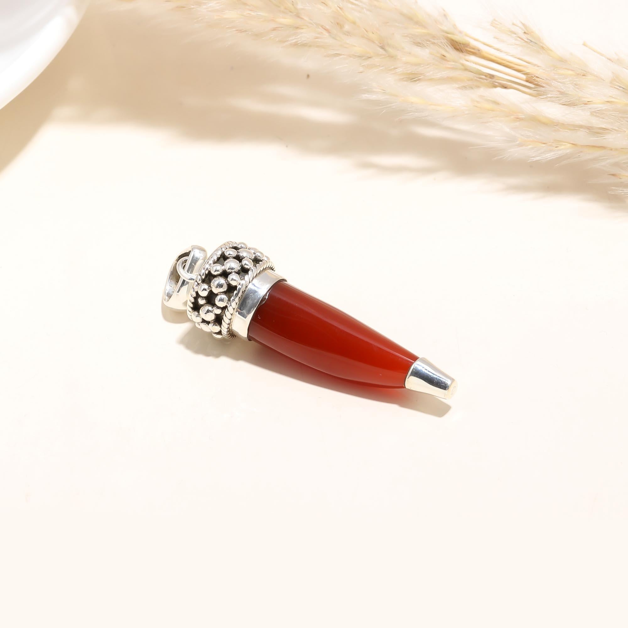 The Crimson Spike: Red Carnelian Bullet Pendant