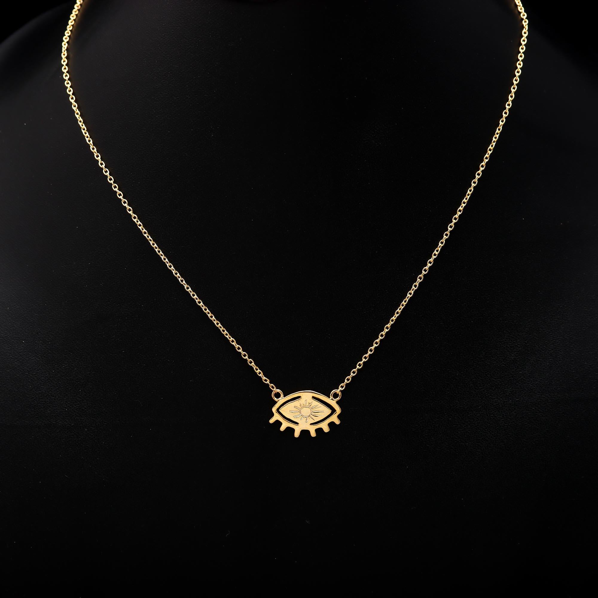 The Solar Gaze: Gold Eye & Sunburst Pendant Necklace