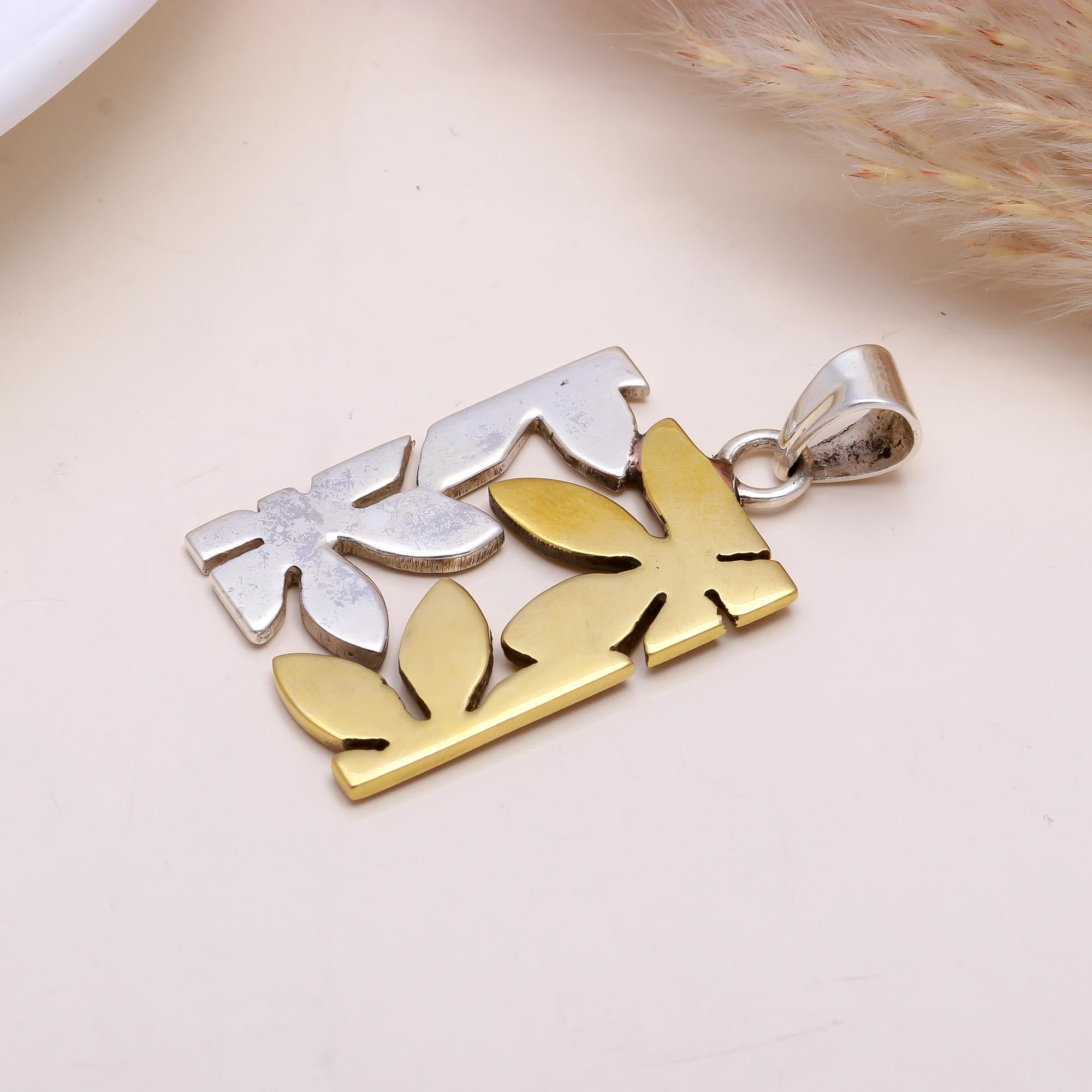 The Botanical Puzzle: Two-Tone Geometric Leaf Pendant