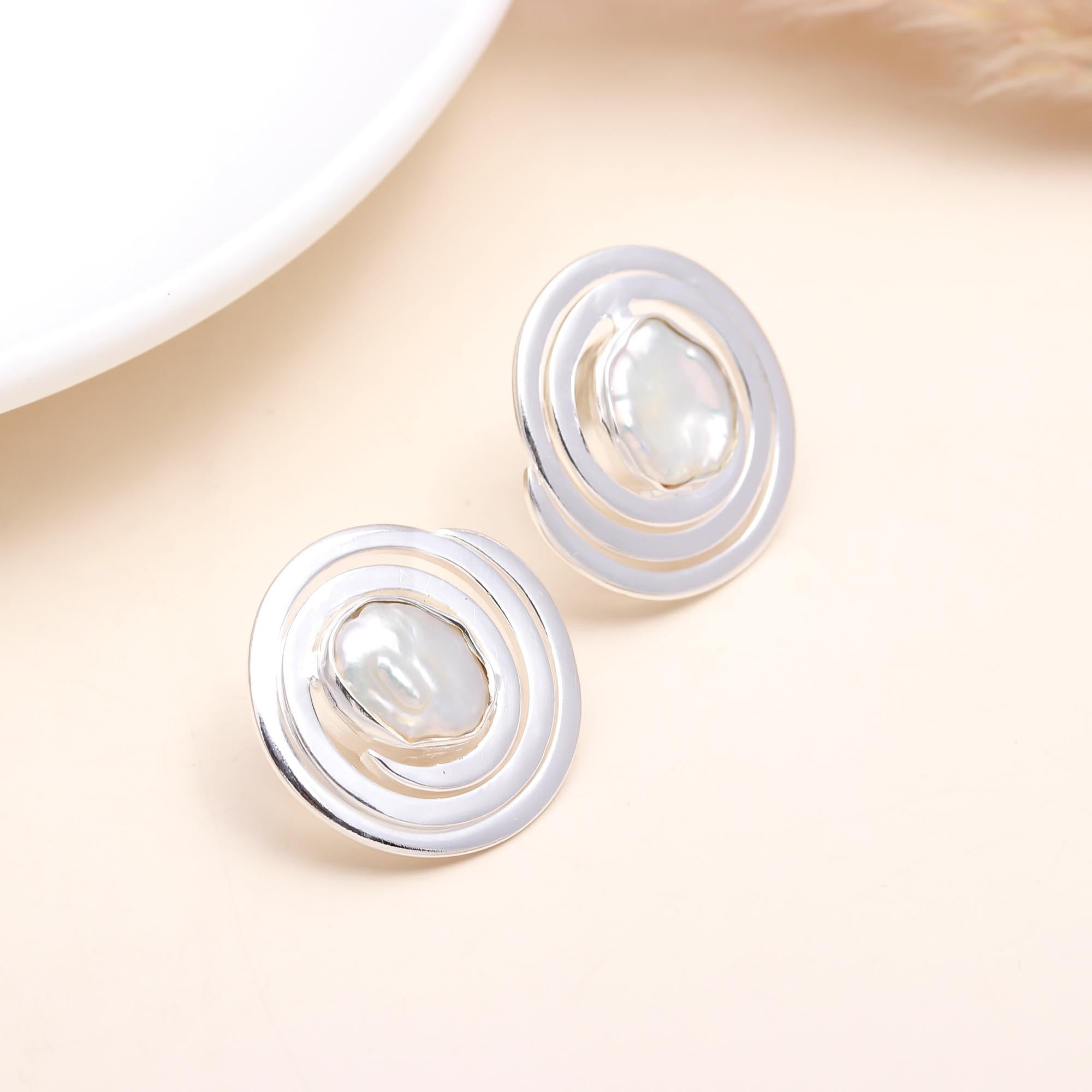 The Lunar Swirl: Pearl Silver Spiral Stud Earrings