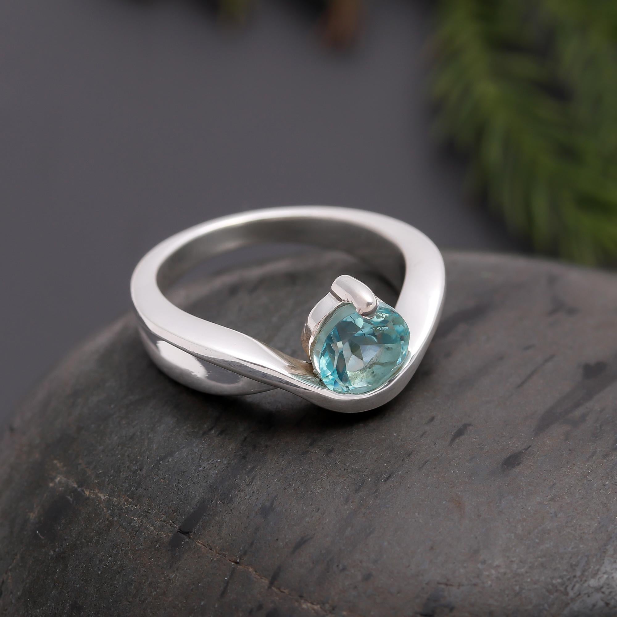 The Azure Swirl: Blue Topaz & Silver Bypass Ring