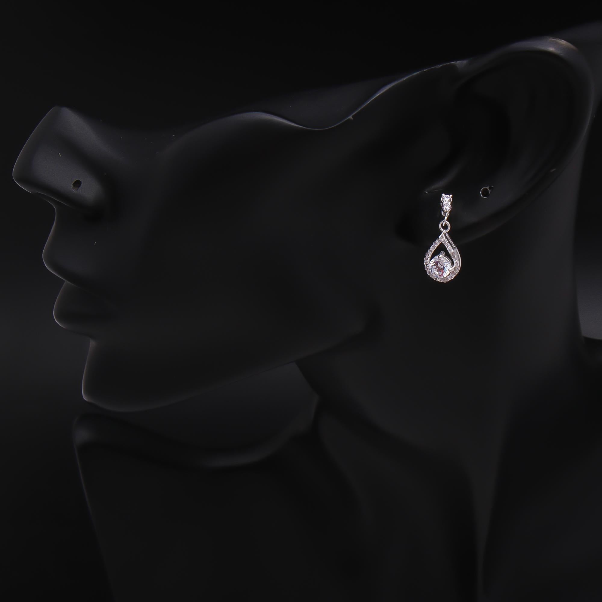The Crystal Cascade: Cubic Zirconia & Silver Halo stud Earrings