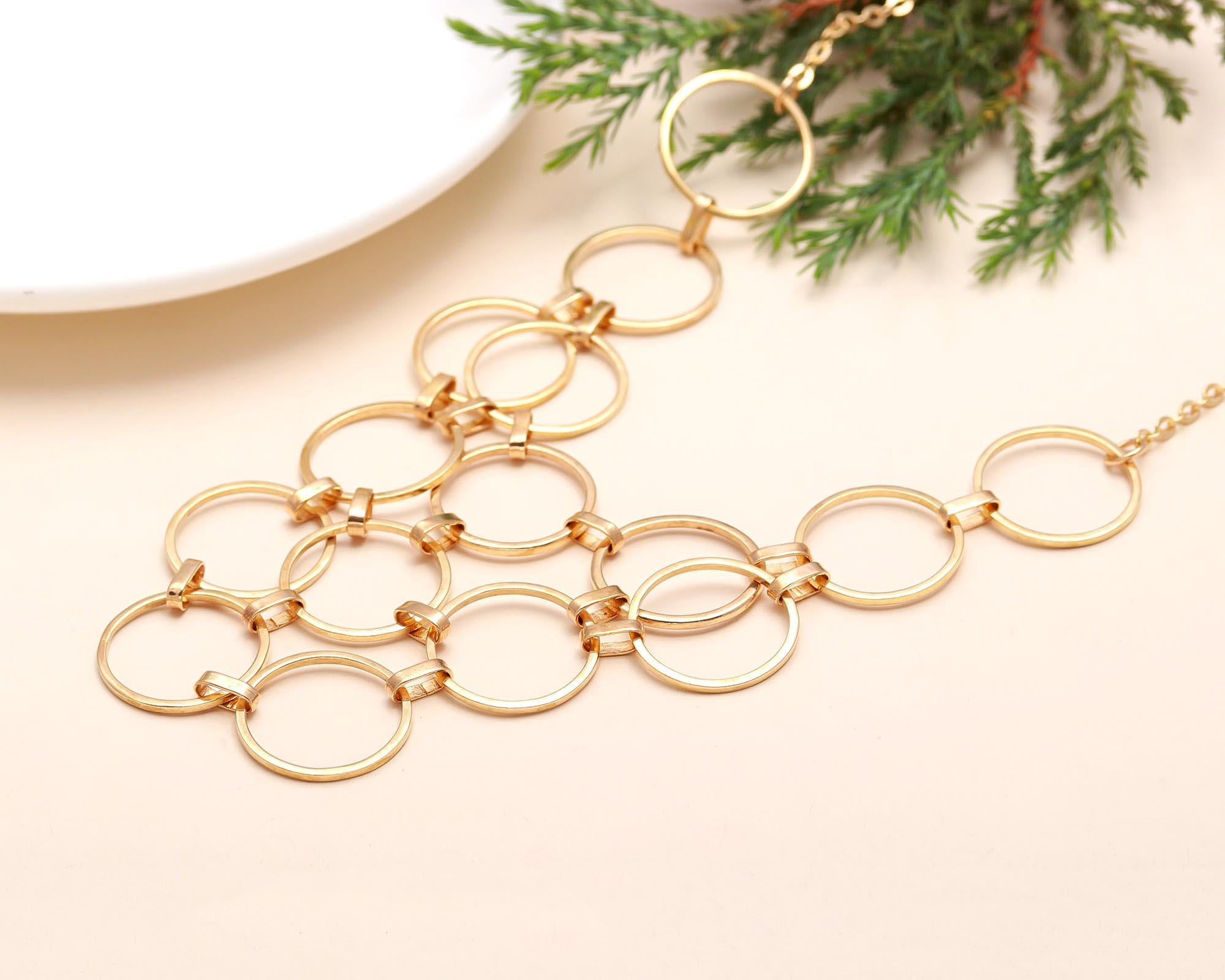 The Golden Armor: Interlocking Ring Bib Necklace