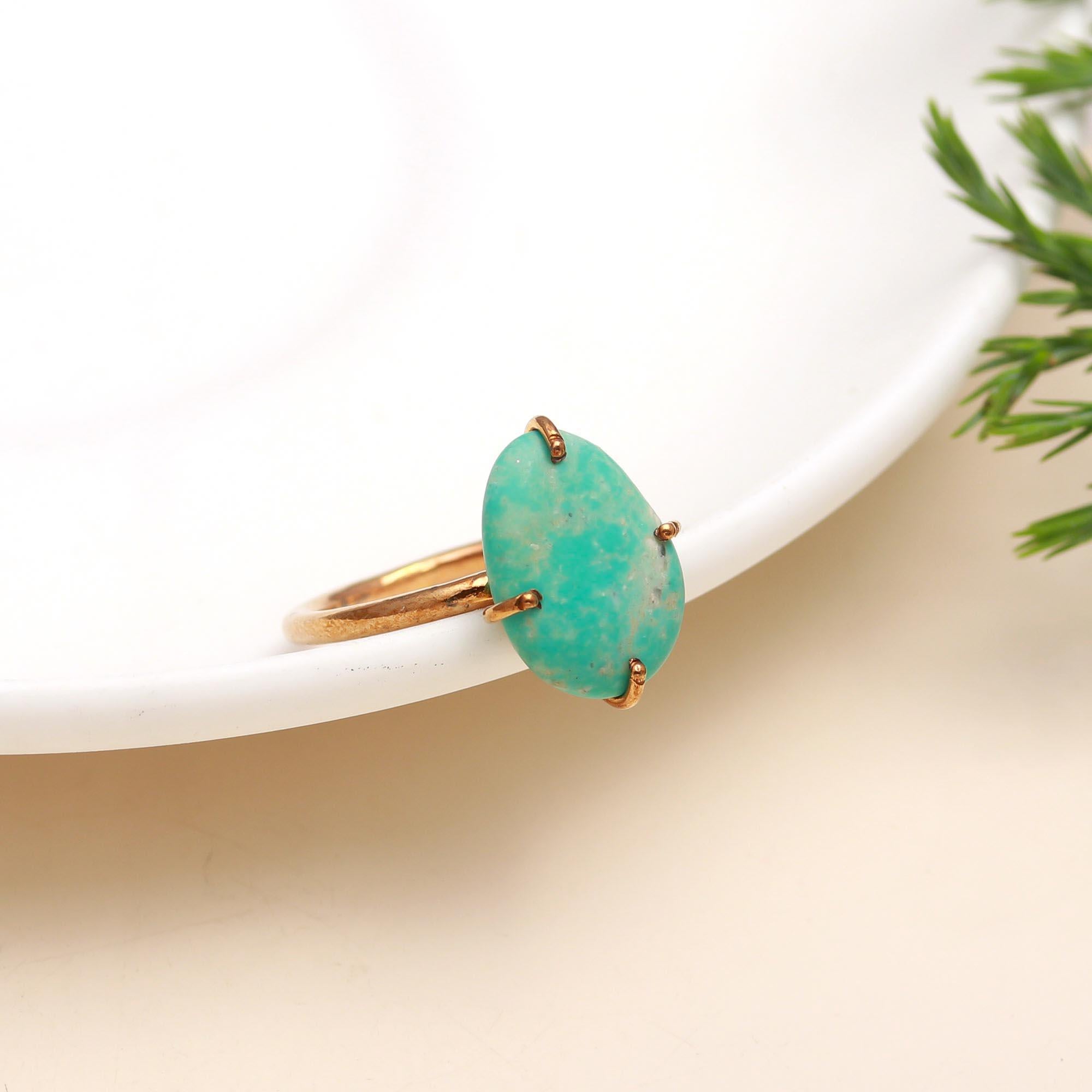 The Turquoise Solitaire: Classic Oval Cabochon Ring