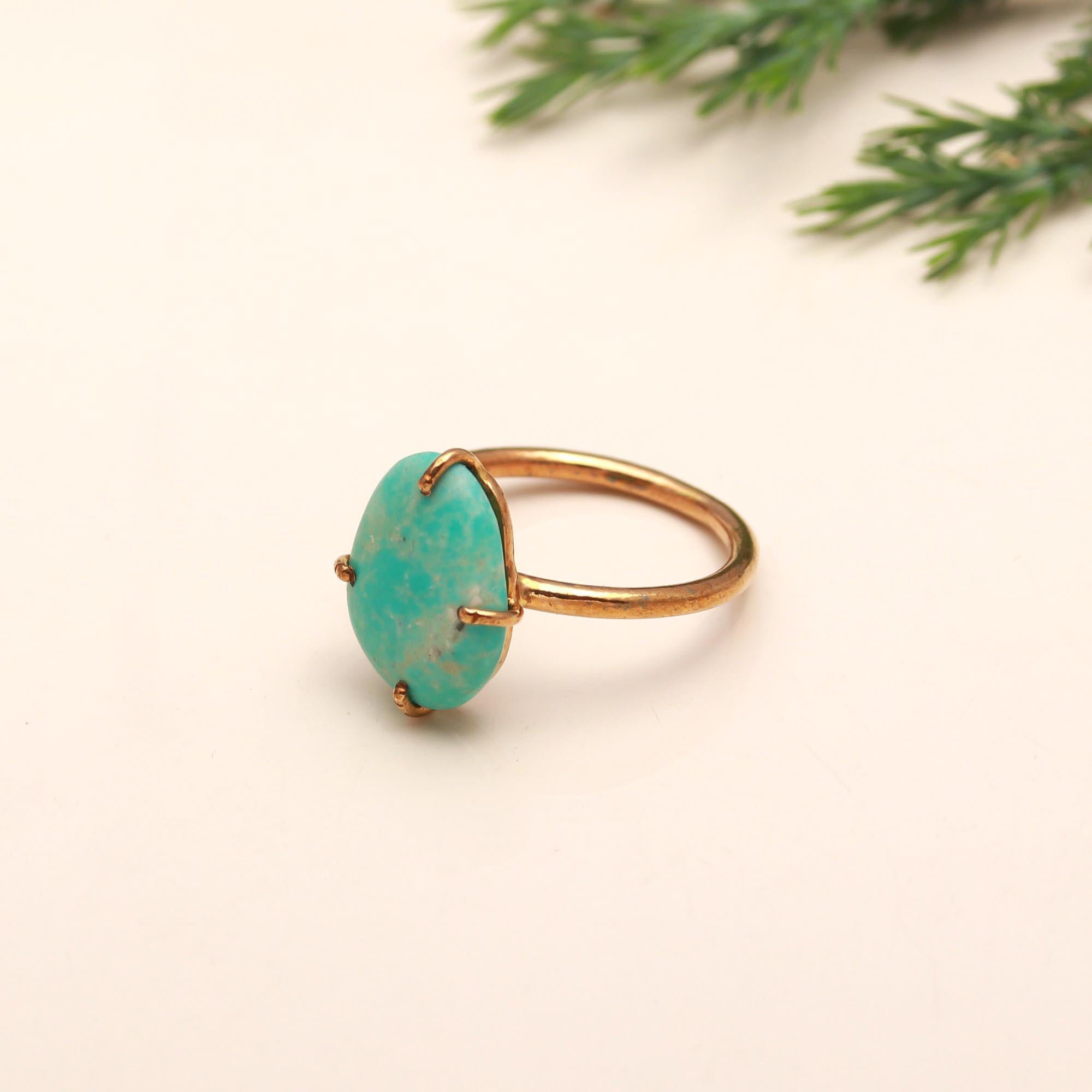 The Turquoise Solitaire: Classic Oval Cabochon Ring