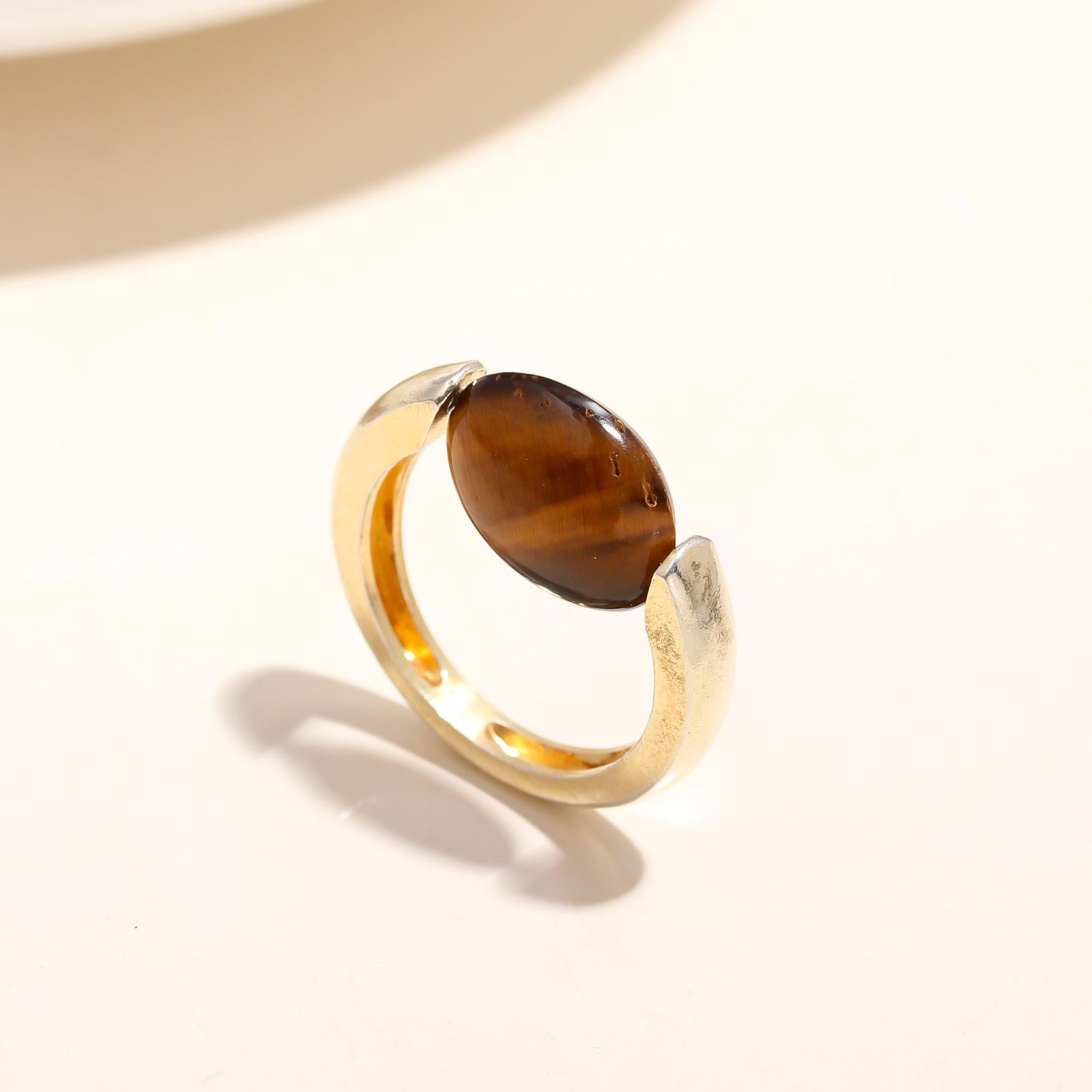 The Modern Tension: Tiger's Eye Floating Disc Ring