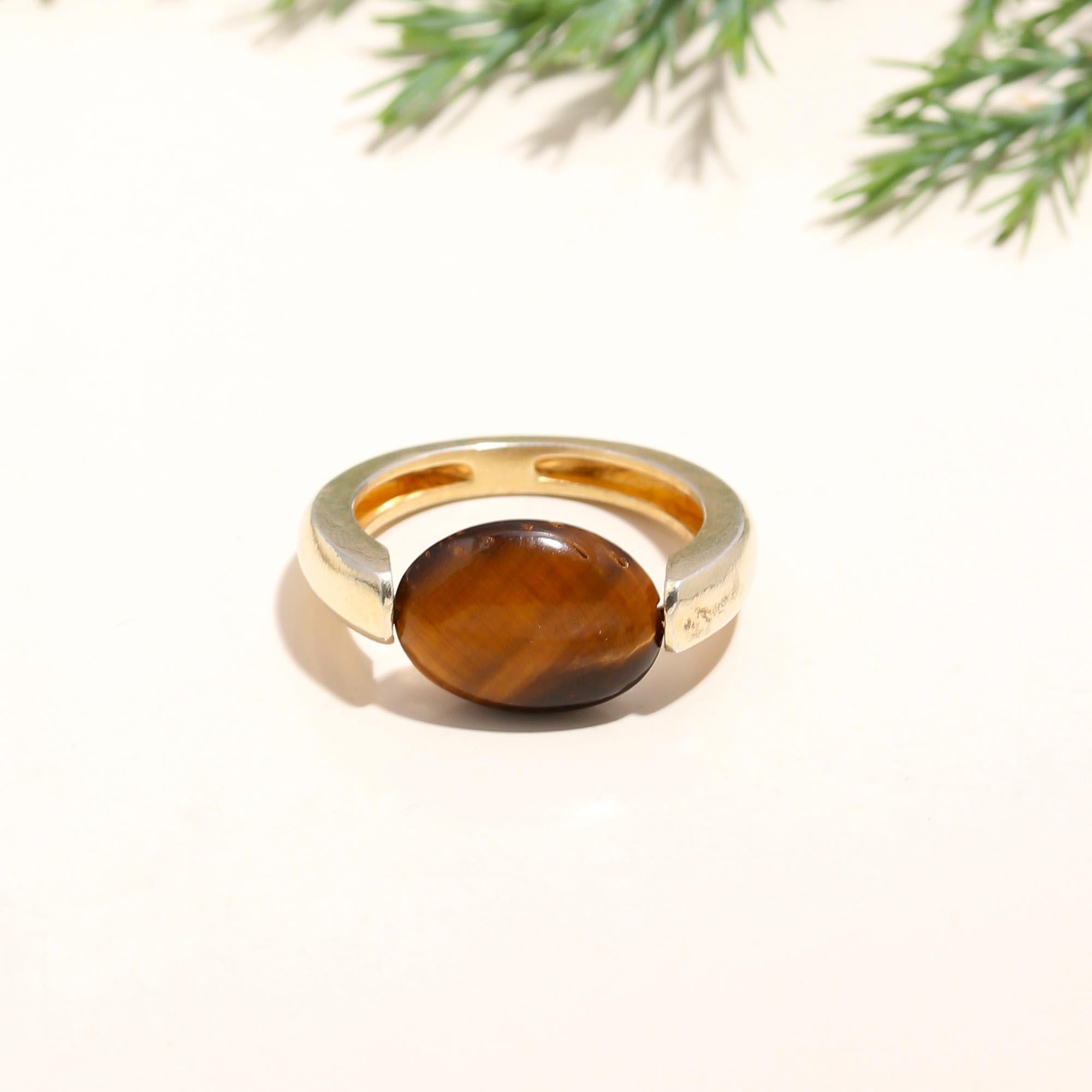 The Modern Tension: Tiger's Eye Floating Disc Ring