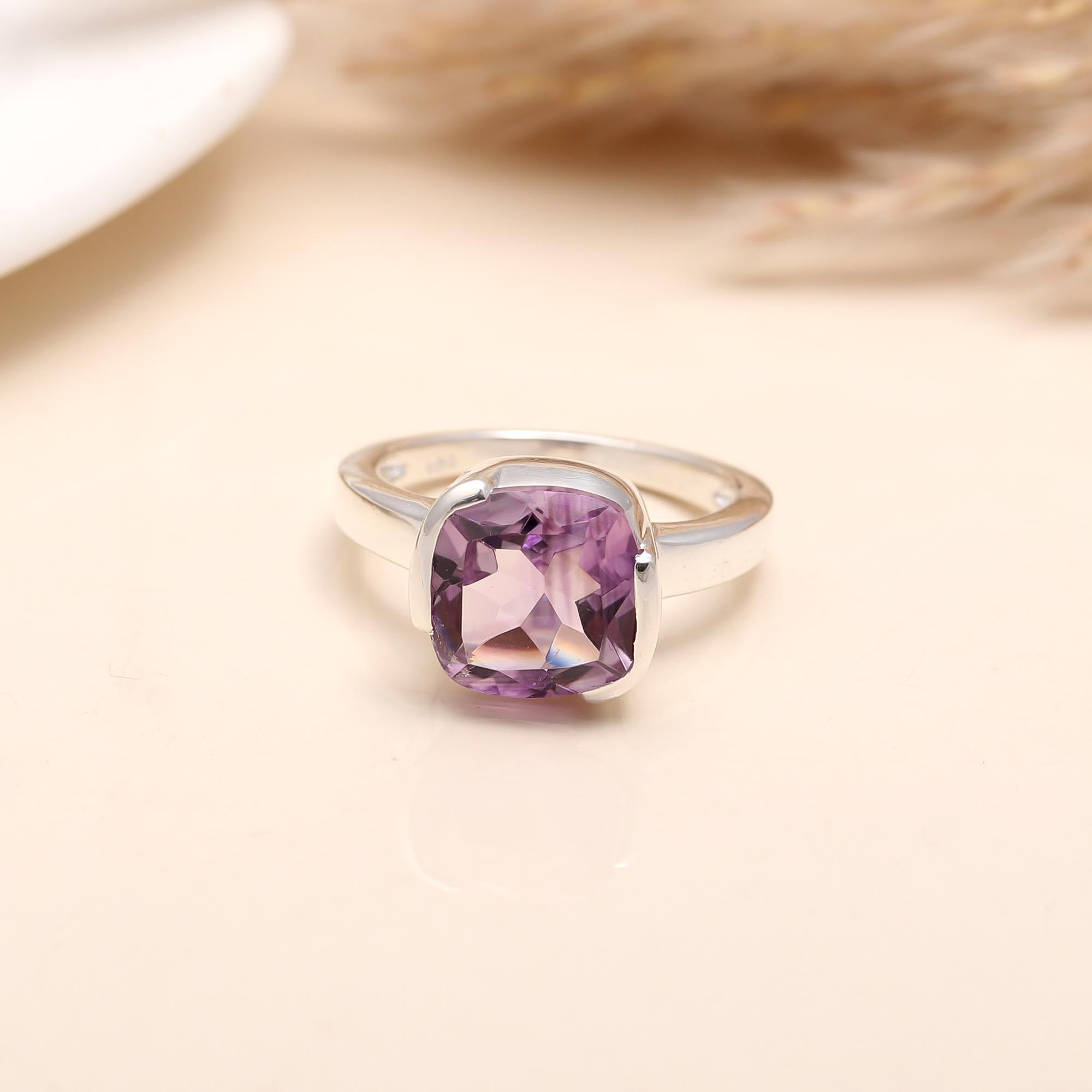 Purple cushion-cut amethyst ring with silver band