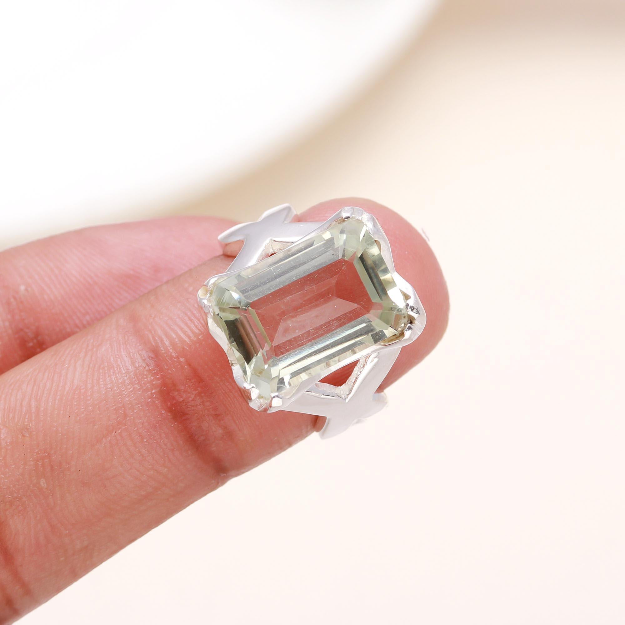 Elegant green amethyst crown ring on finger