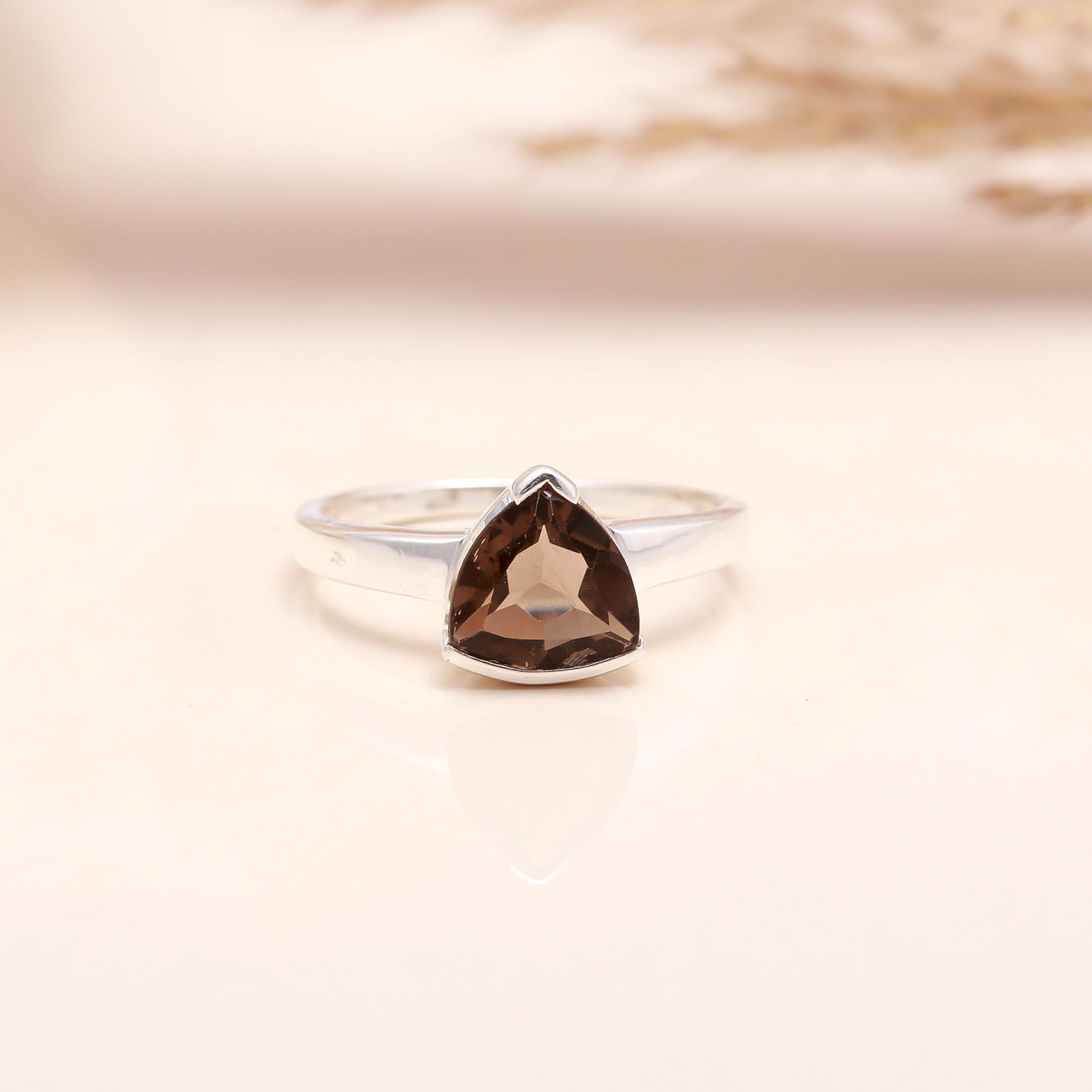 Faceted smoky quartz solitaire ring in sterling silver