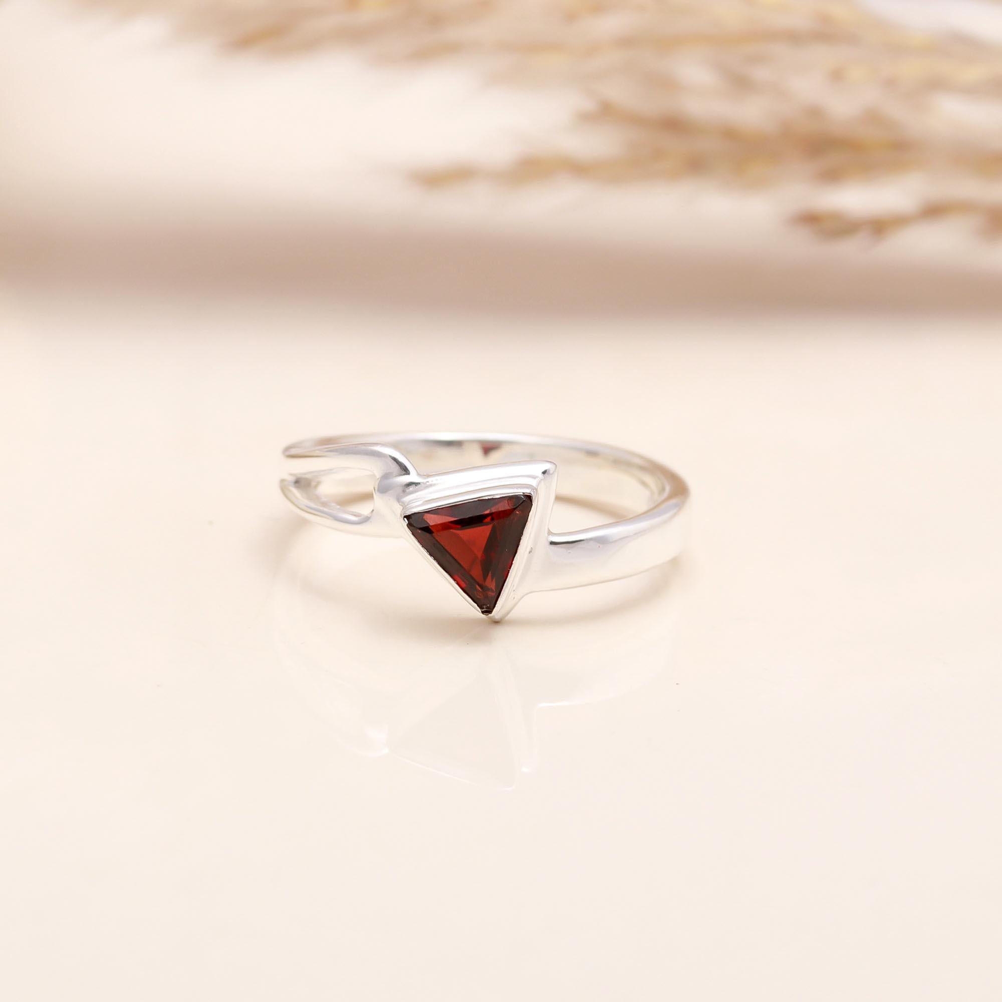 Trillion garnet gemstone on sterling silver open band ring